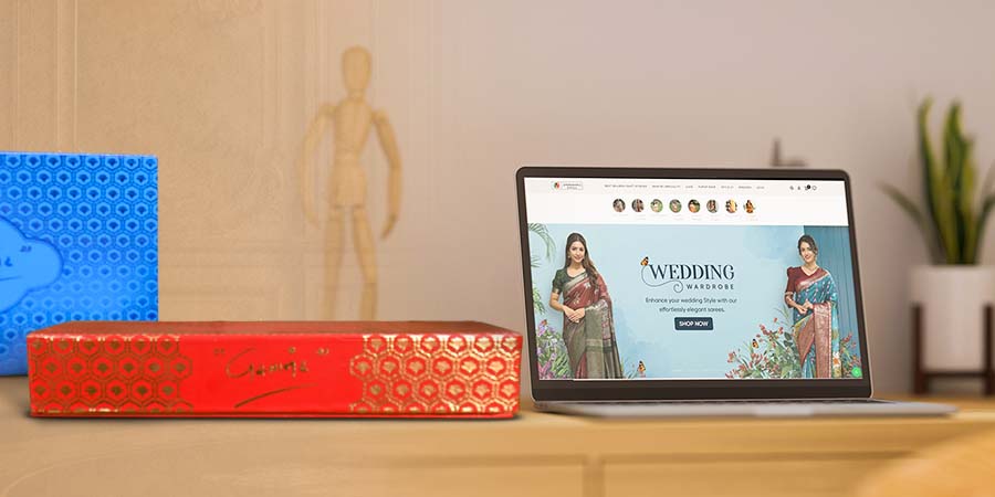 Laptop displaying Vastranand sarees on ONDC platform.