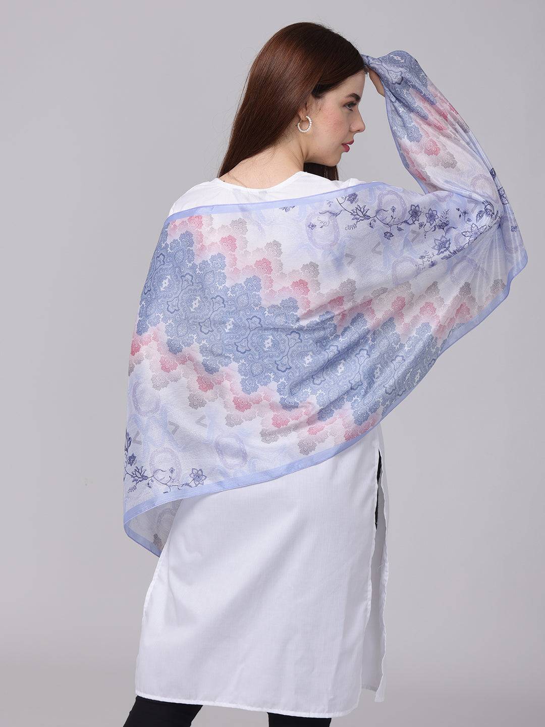 Side view of ethnic motifs scarf draped elegantly