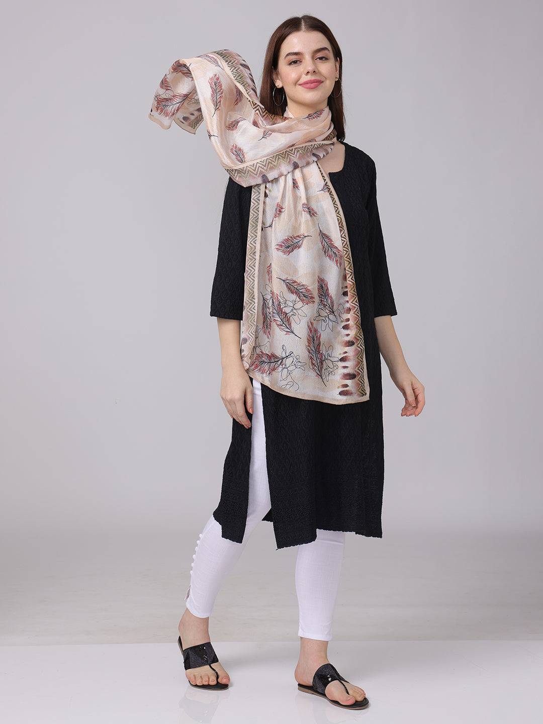 Model showcasing feather pattern geometric borde scarf, draped style