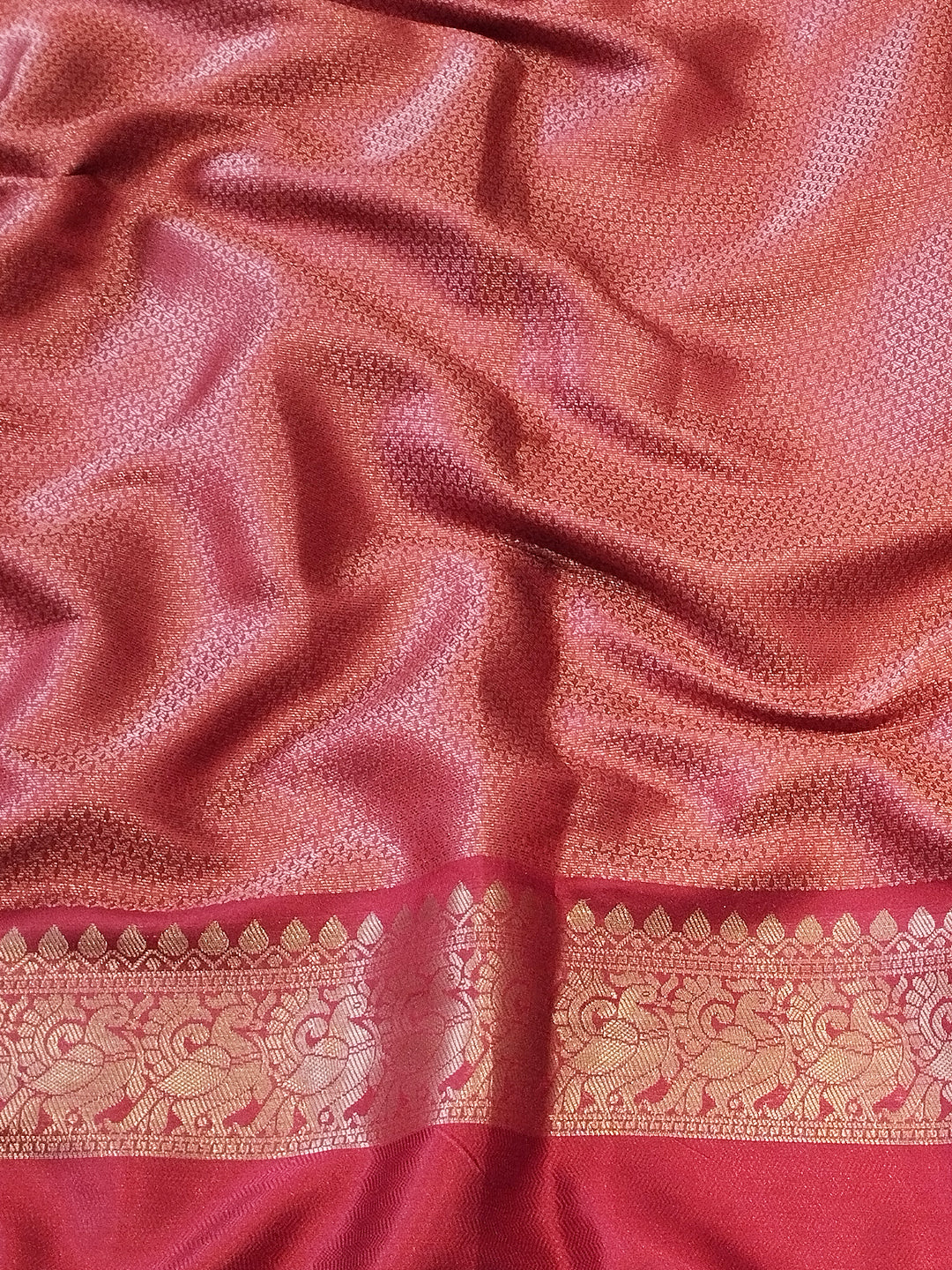 Textured fabric of Banarasi Silk Saree with gold motifs