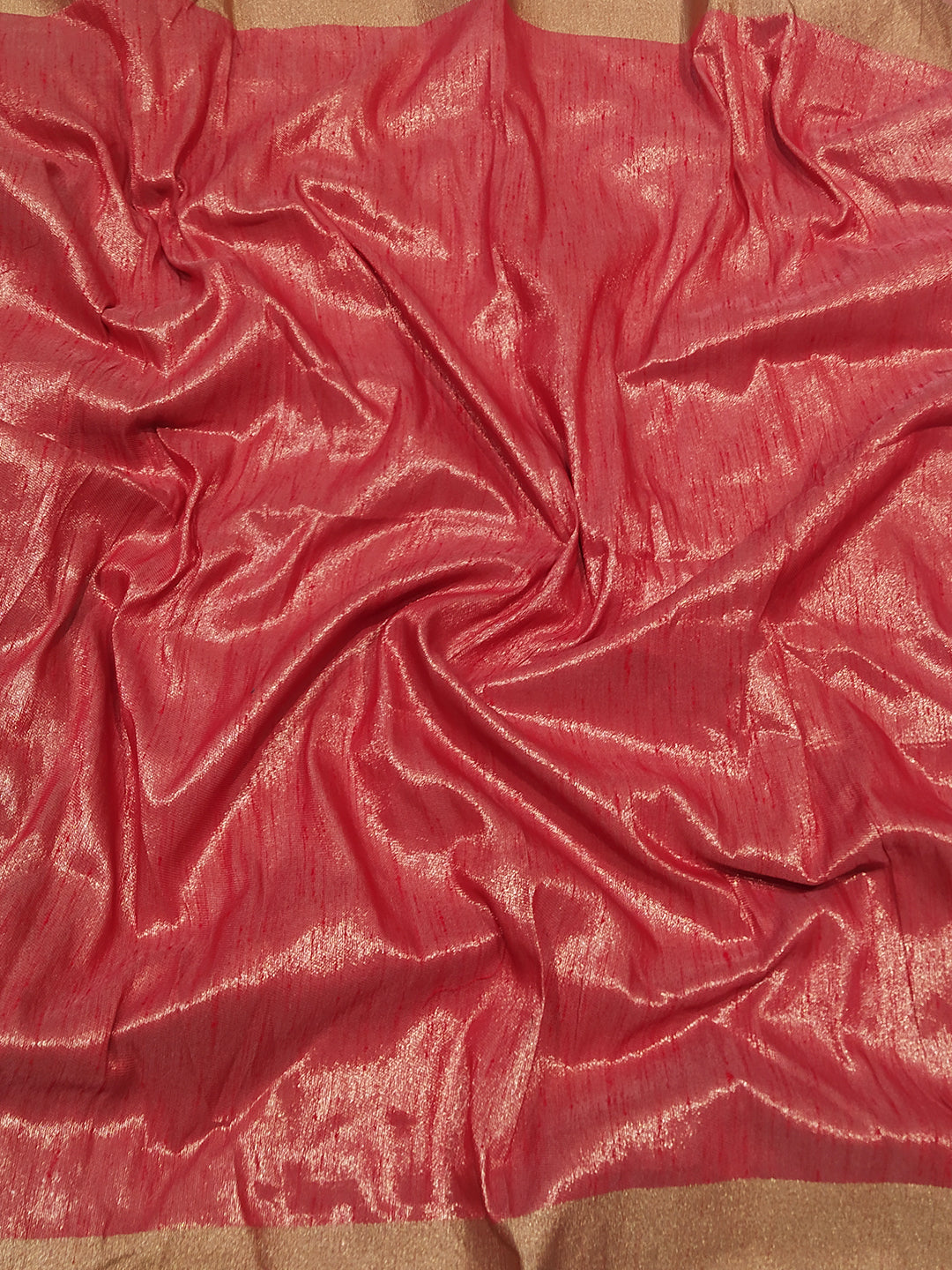 Close-up of red fabric from Kalamkari Linen Tissue Soft Saree.