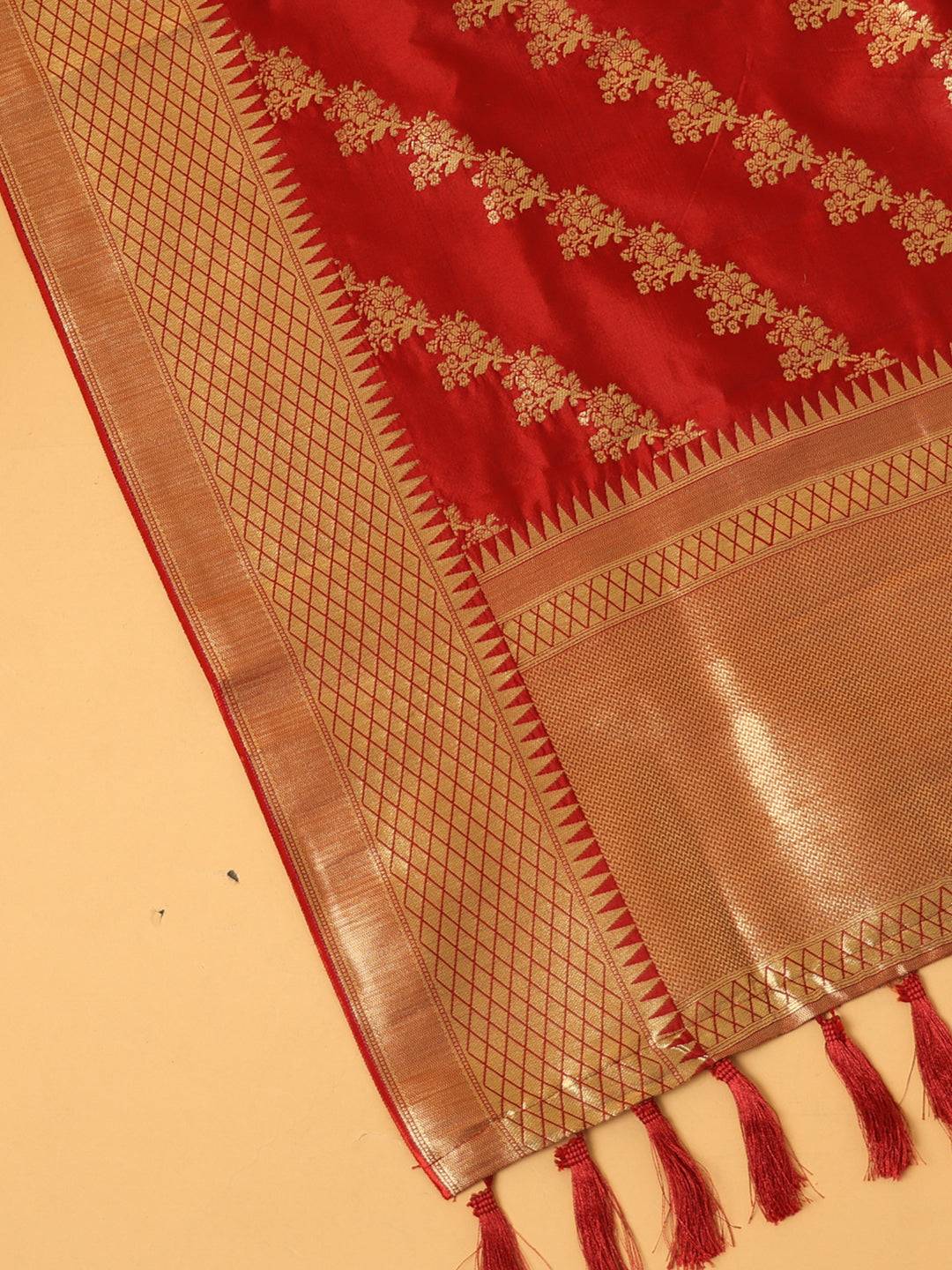 Close-up of red woven design dupatta fabric