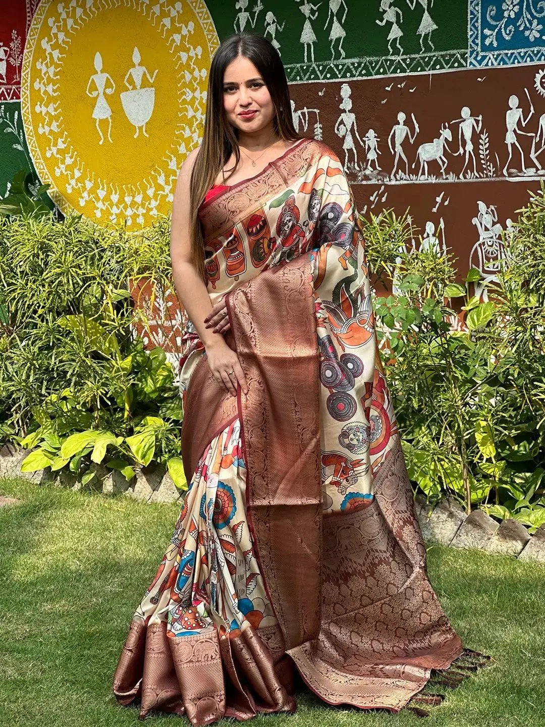 Brown soft silk saree featuring vibrant Kalamkari prints