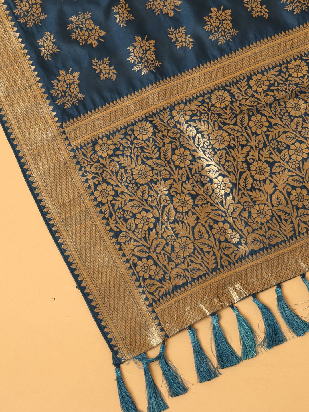 Close-up of woven design on teal silk blend dupatta