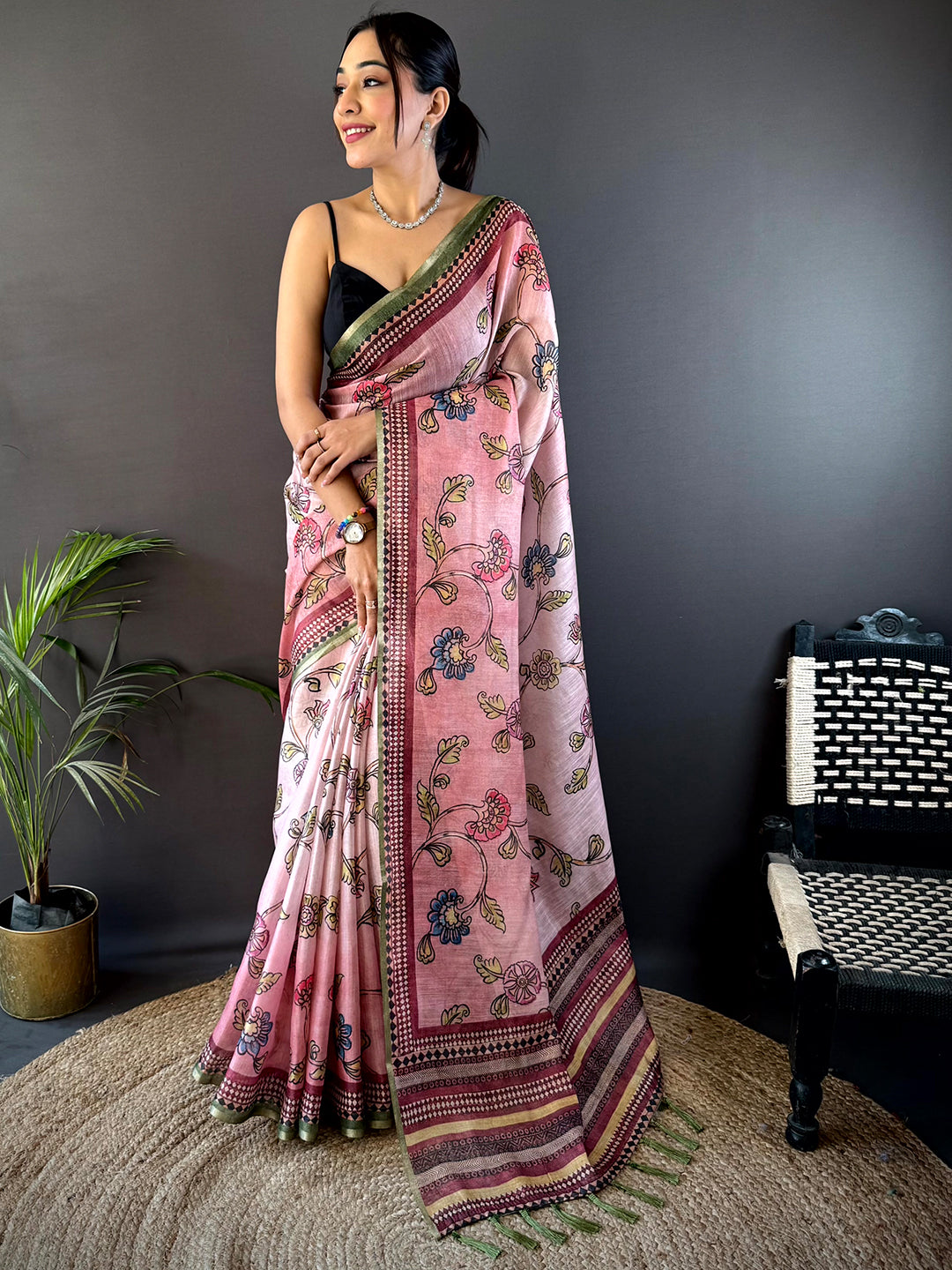 Shop Rose Pink Zari Tussar Floral Saree featuring delicate floral motifs and a luxurious zari border, ideal for parties and celebrations.