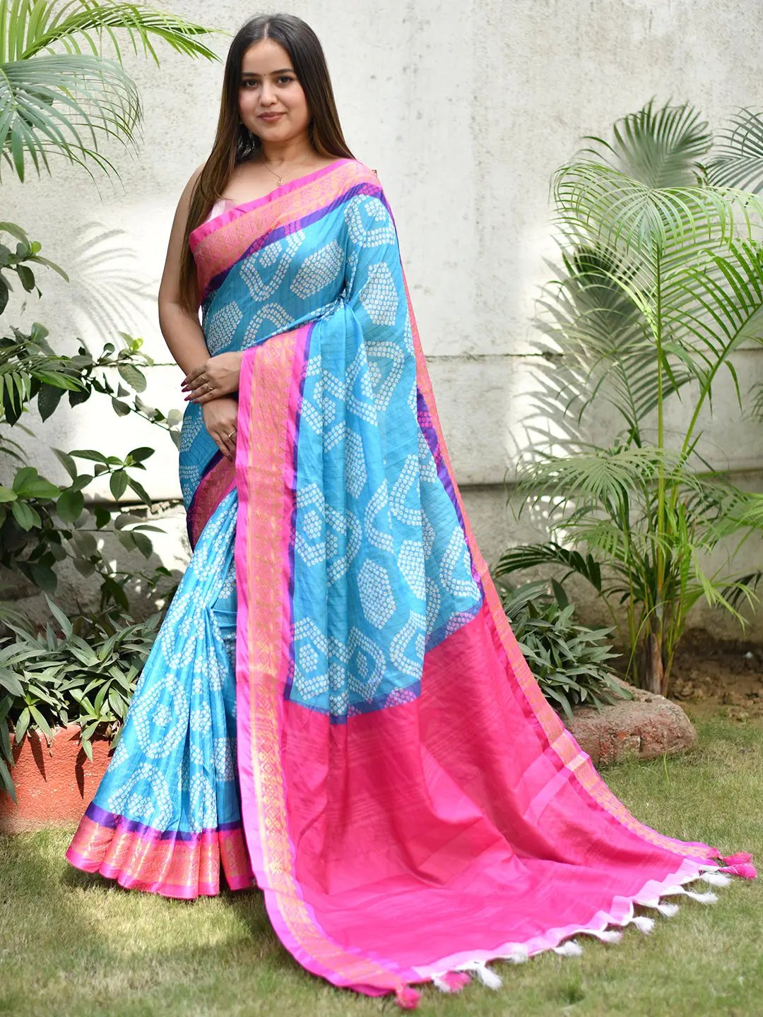 Traditional Bandhej print saree with pink Kanjivaaram border