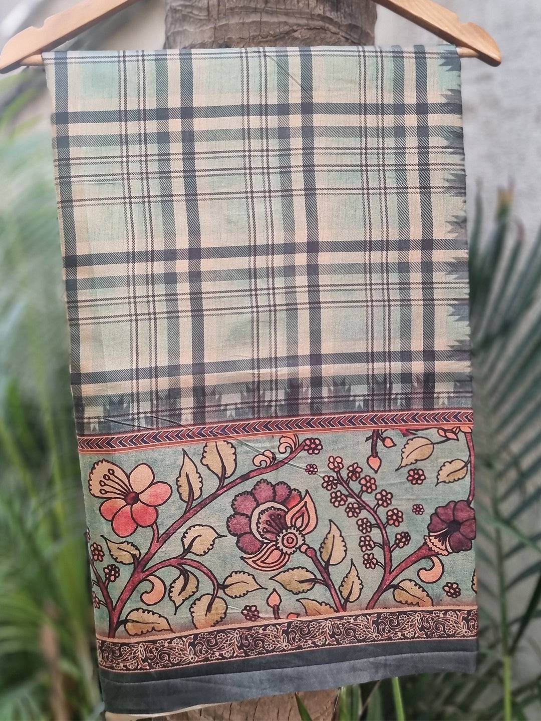 Tussar silk saree with flower kalamkari and chex motifs on hanger