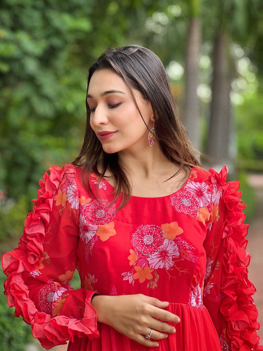 Detailed view of Radiant Ruby Dress with ruffled sleeves