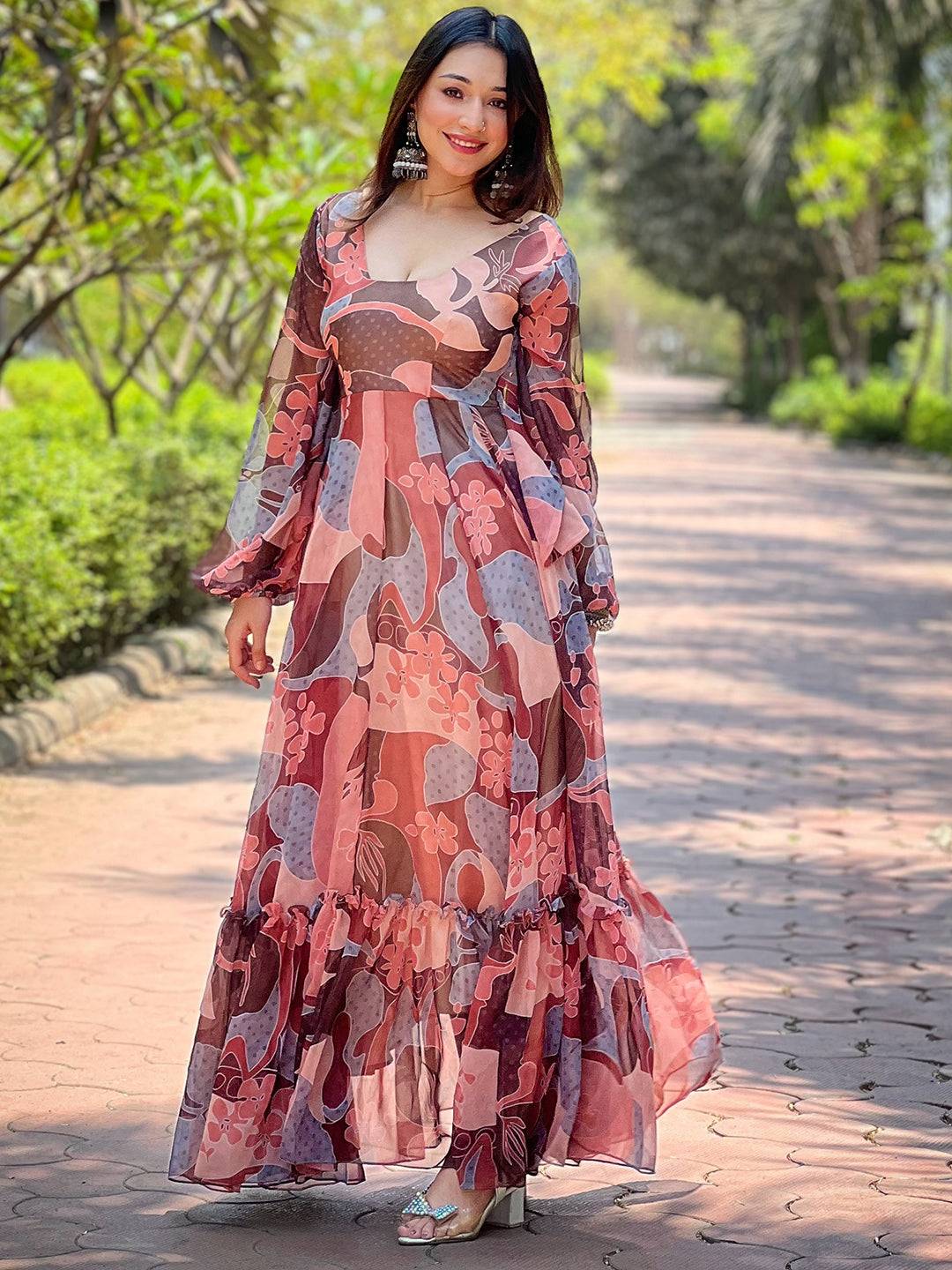 Model wearing coffee brown abstract print dress outdoors