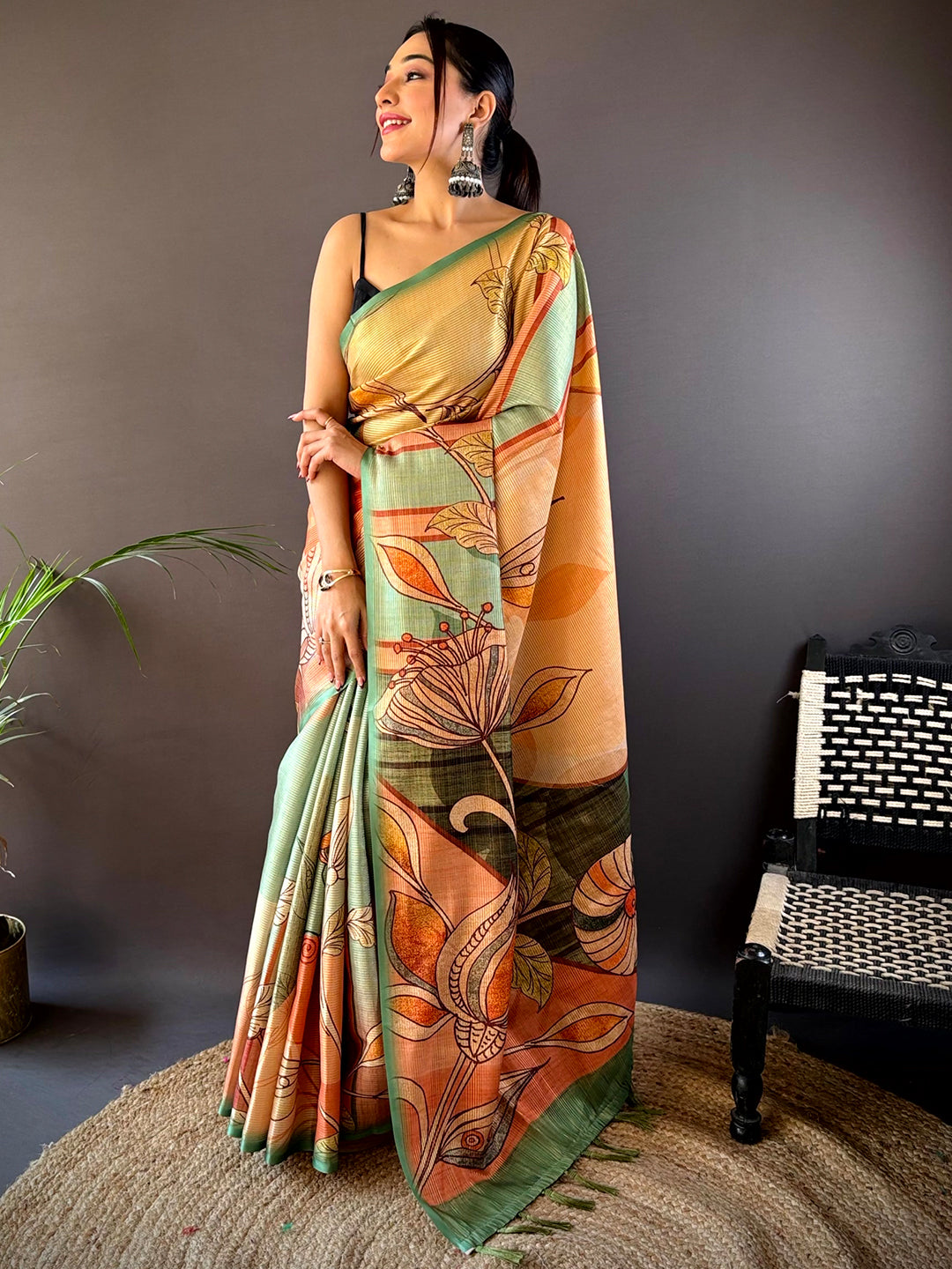 Elegant Jade Green Zari Tussar Saree with abstract flowers