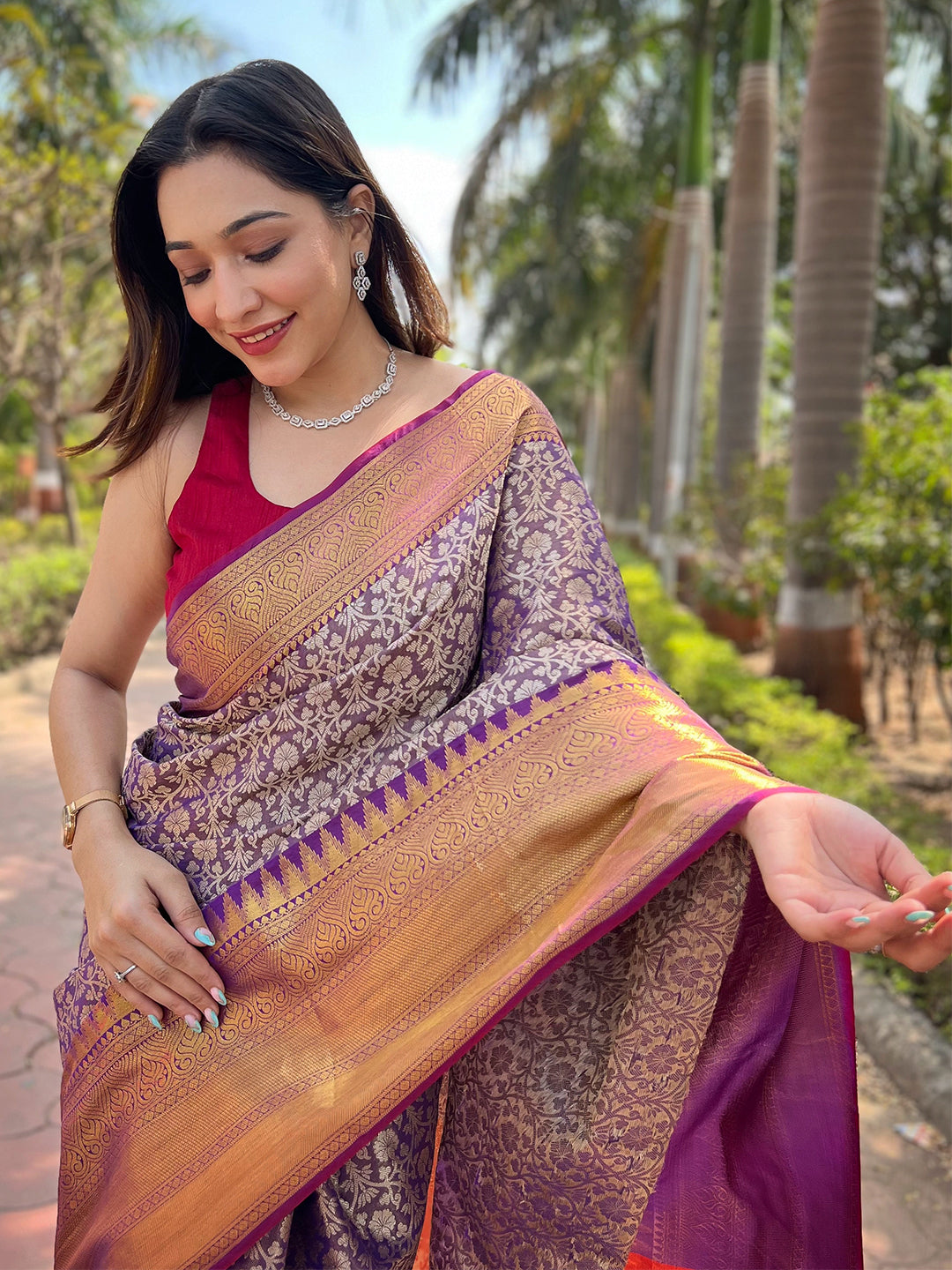 Close-up of Wine Colour Saree with Gold Jacquard Woven Work