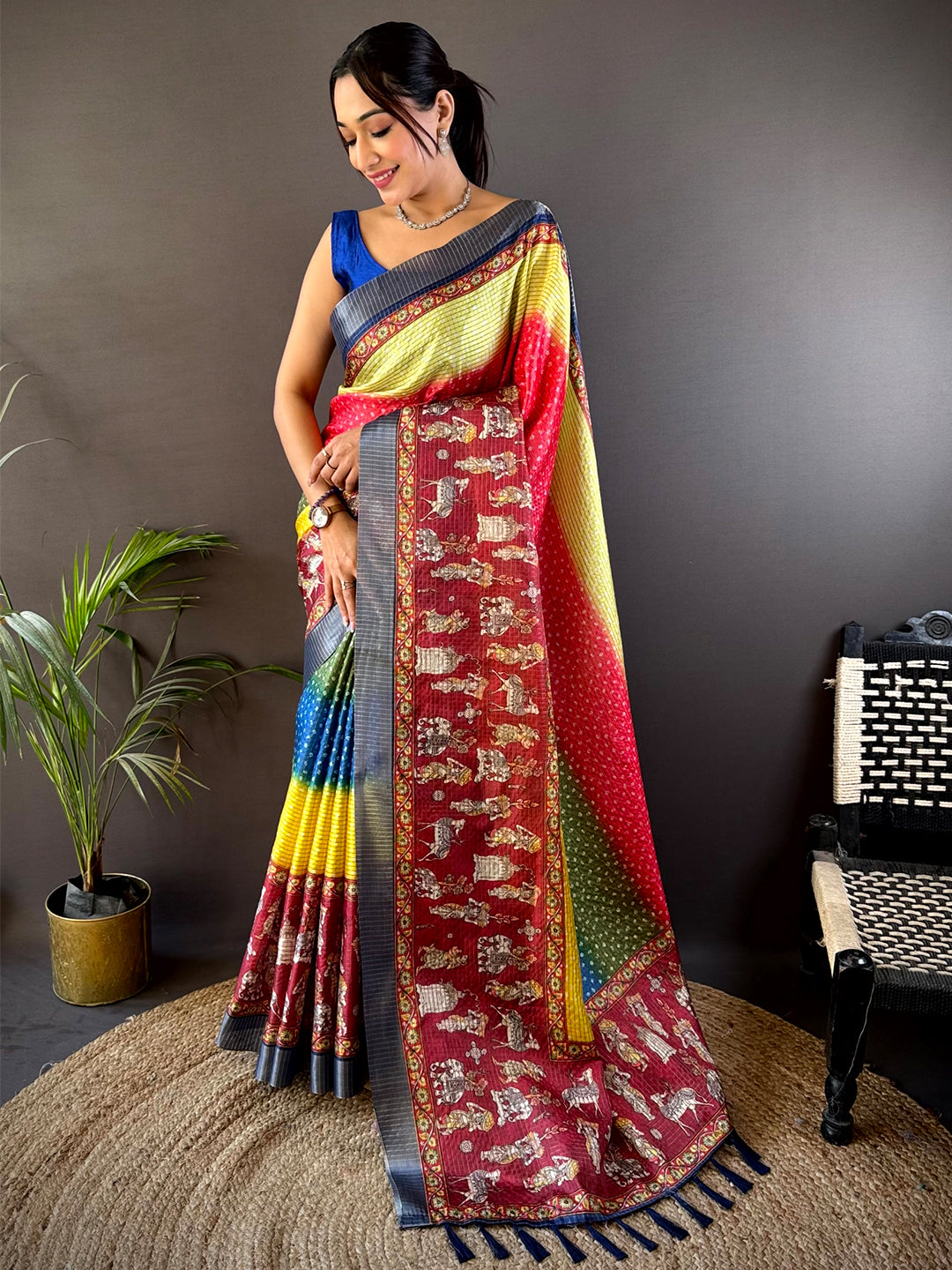 Shop Graceful Silk Blend Bandhani Print Saree featuring a rich mix of colors and traditional motifs, ideal for parties and celebrations.