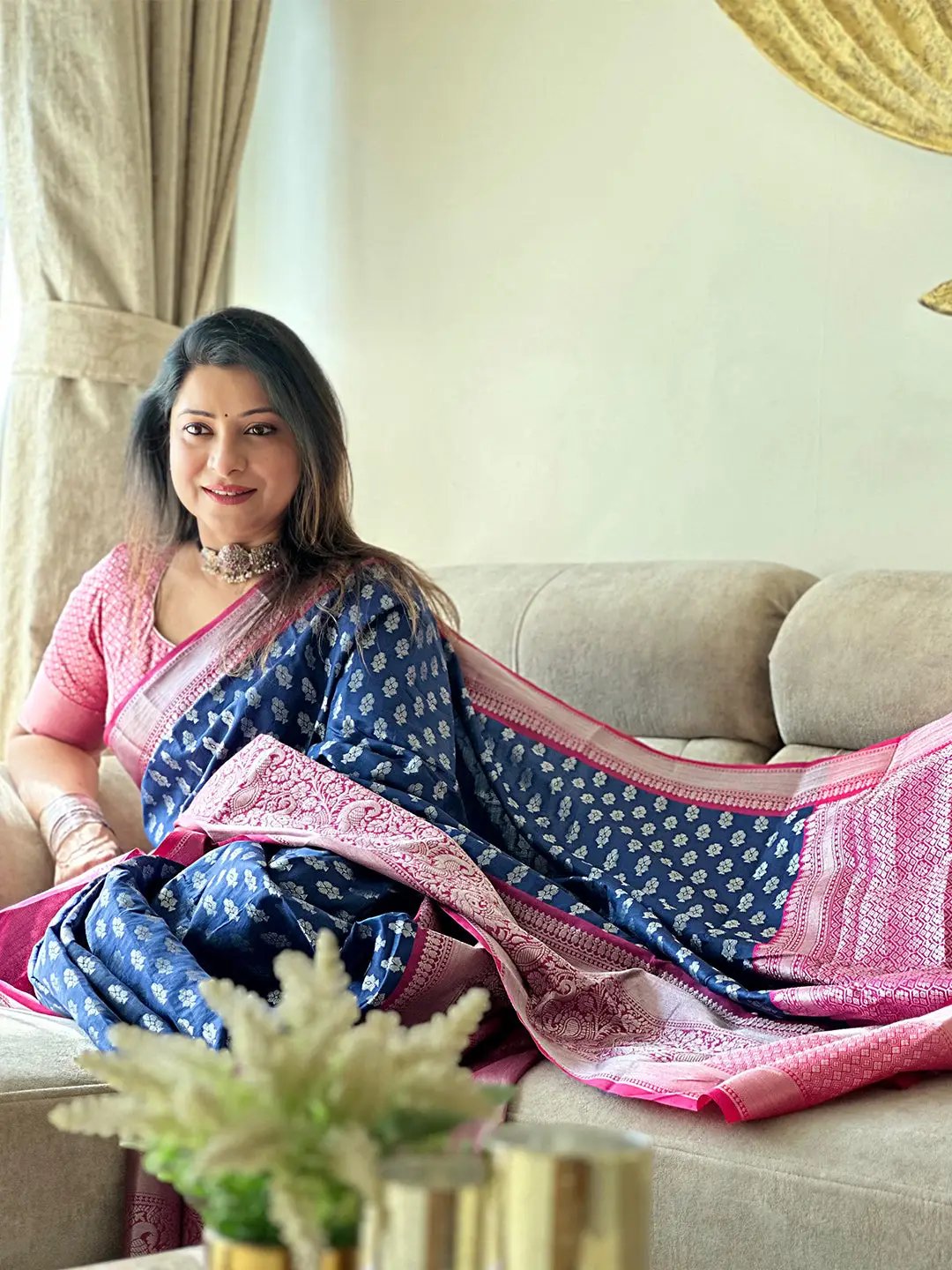 Blue Banarasi Katan Silk Saree draped on sofa