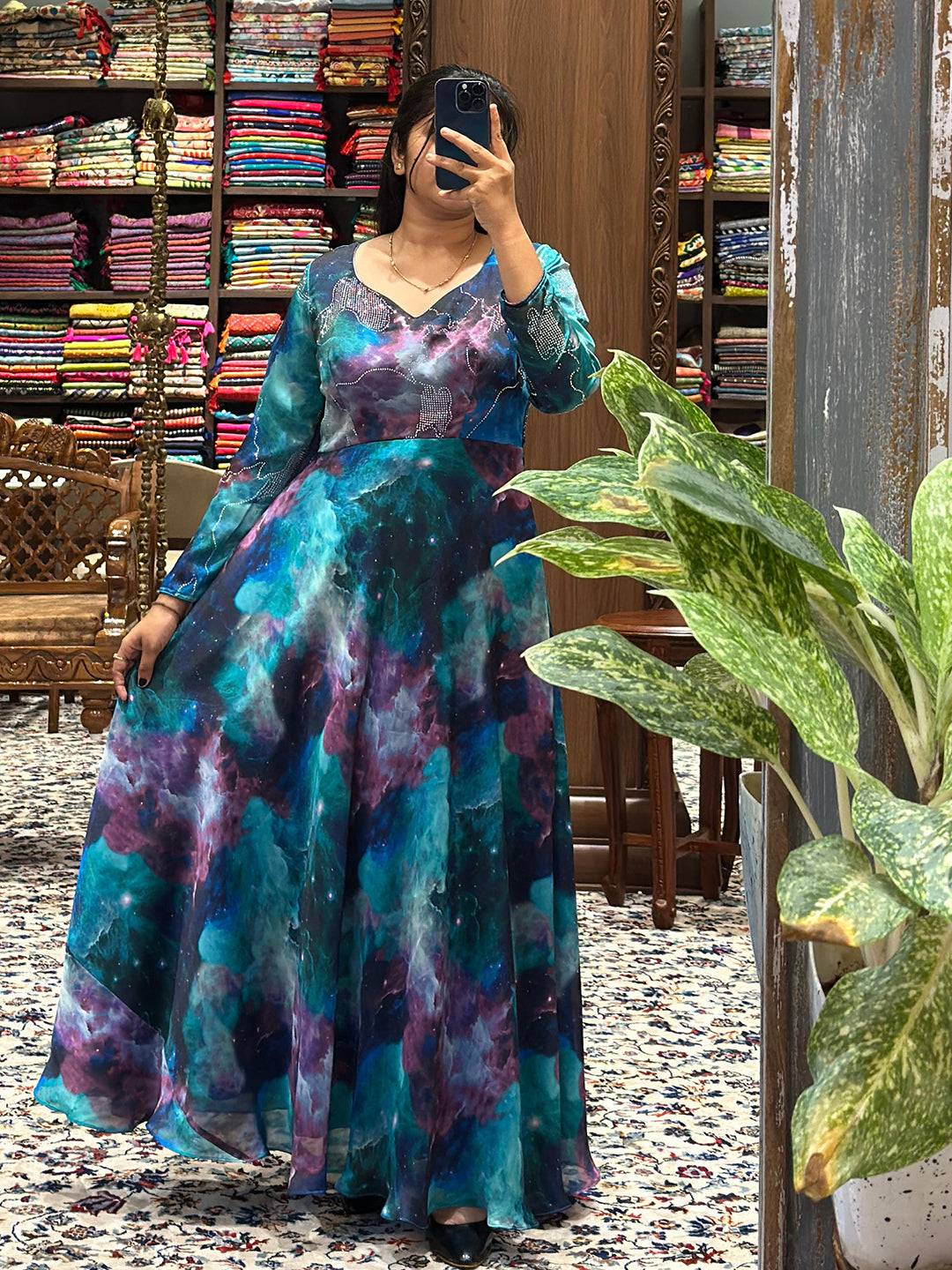 Chic Blue Galaxy Print Dress with generous flare in boutique.