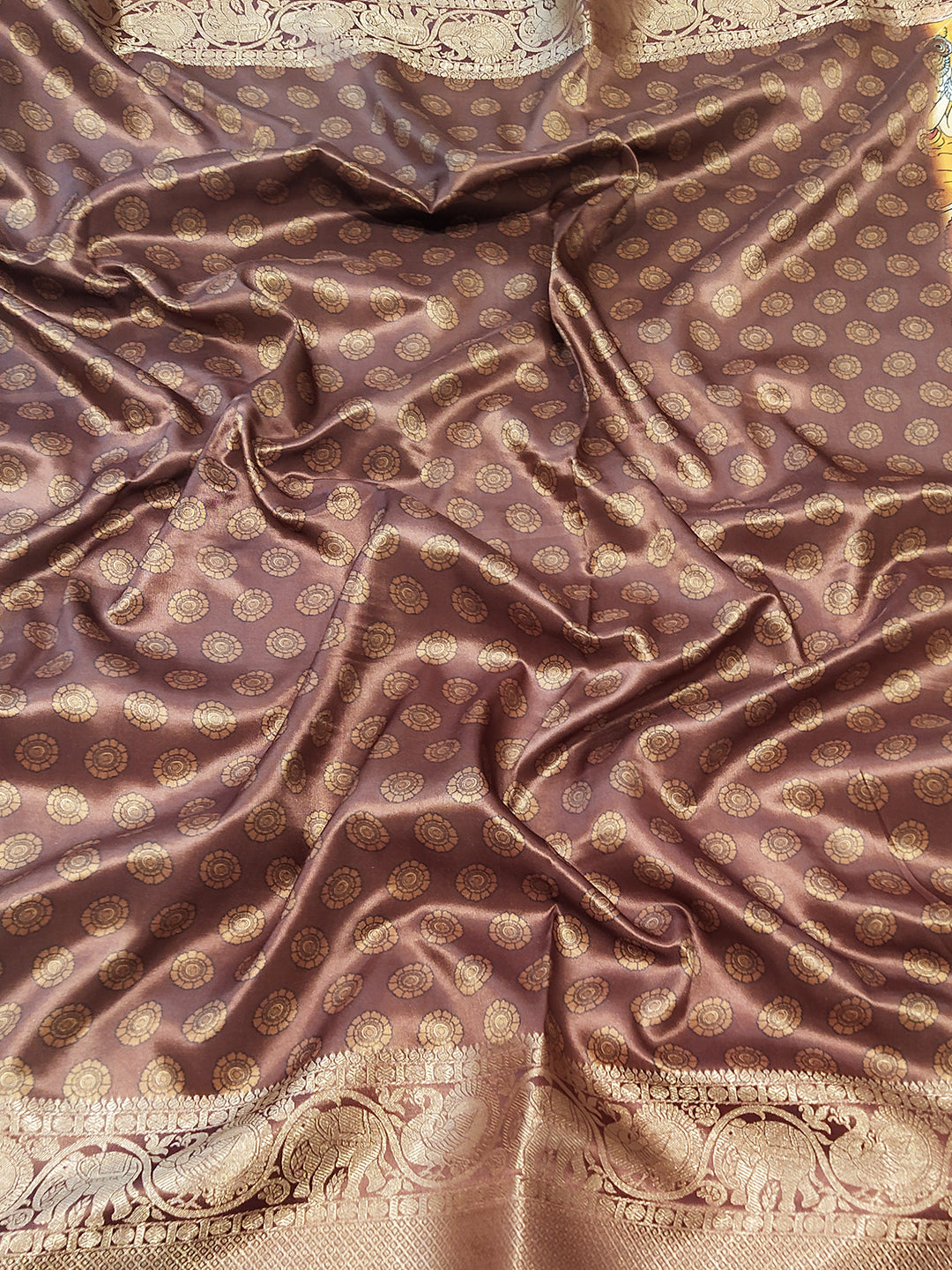 Intricate brown soft silk saree with Kalamkari patterns