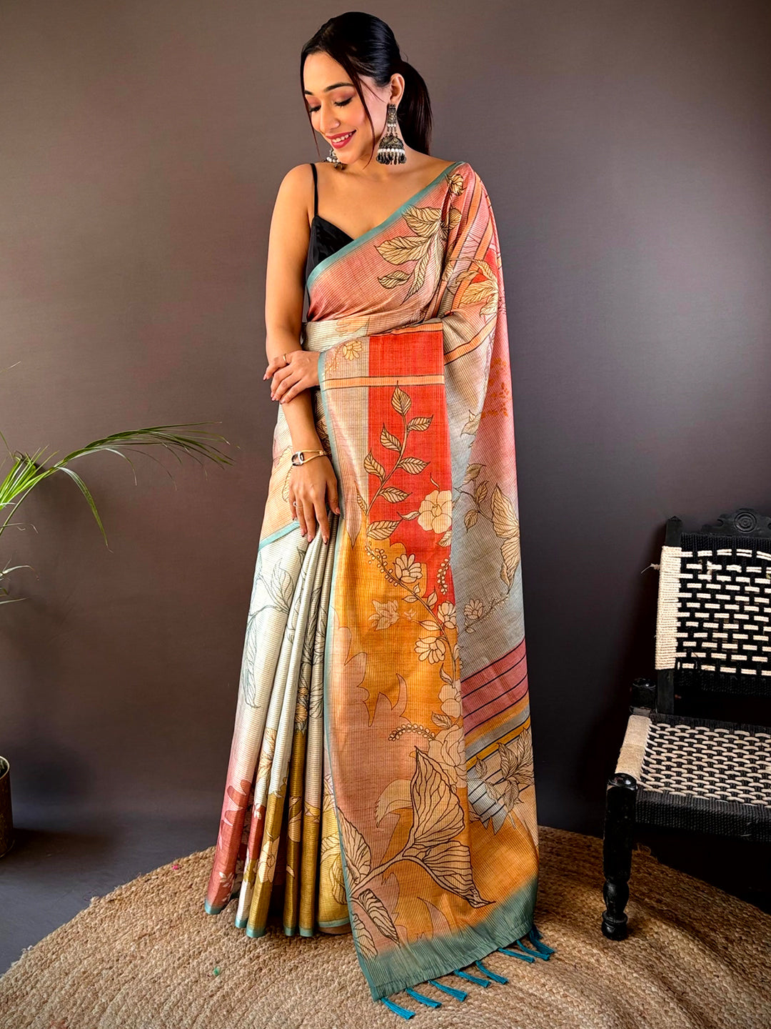 Elegant Rama Zari Tussar Saree featuring abstract floral patterns