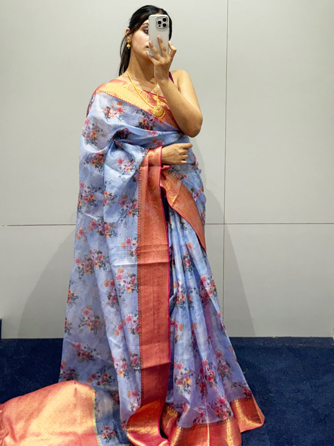 Model wearing light purple floral print Kota silk saree