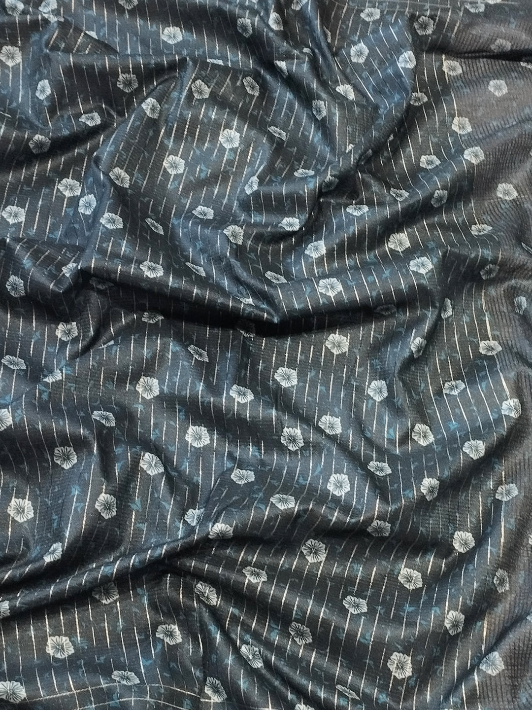 Detailed view of fabric pattern on Satin Kota Doria Saree.