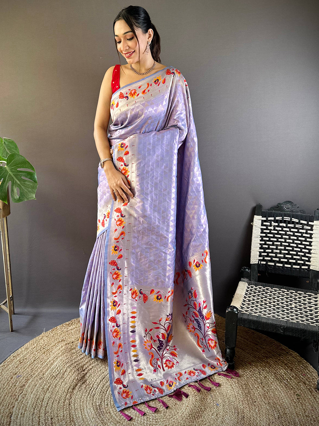 Elegant lavender Paithani saree with intricate floral design