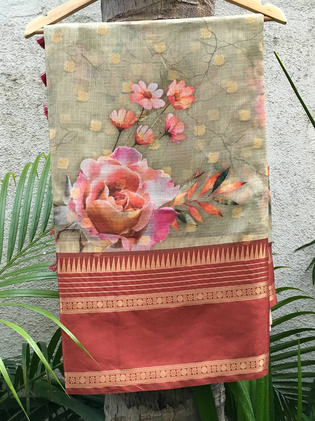 Kota Doriya sage green saree with floral print and red border