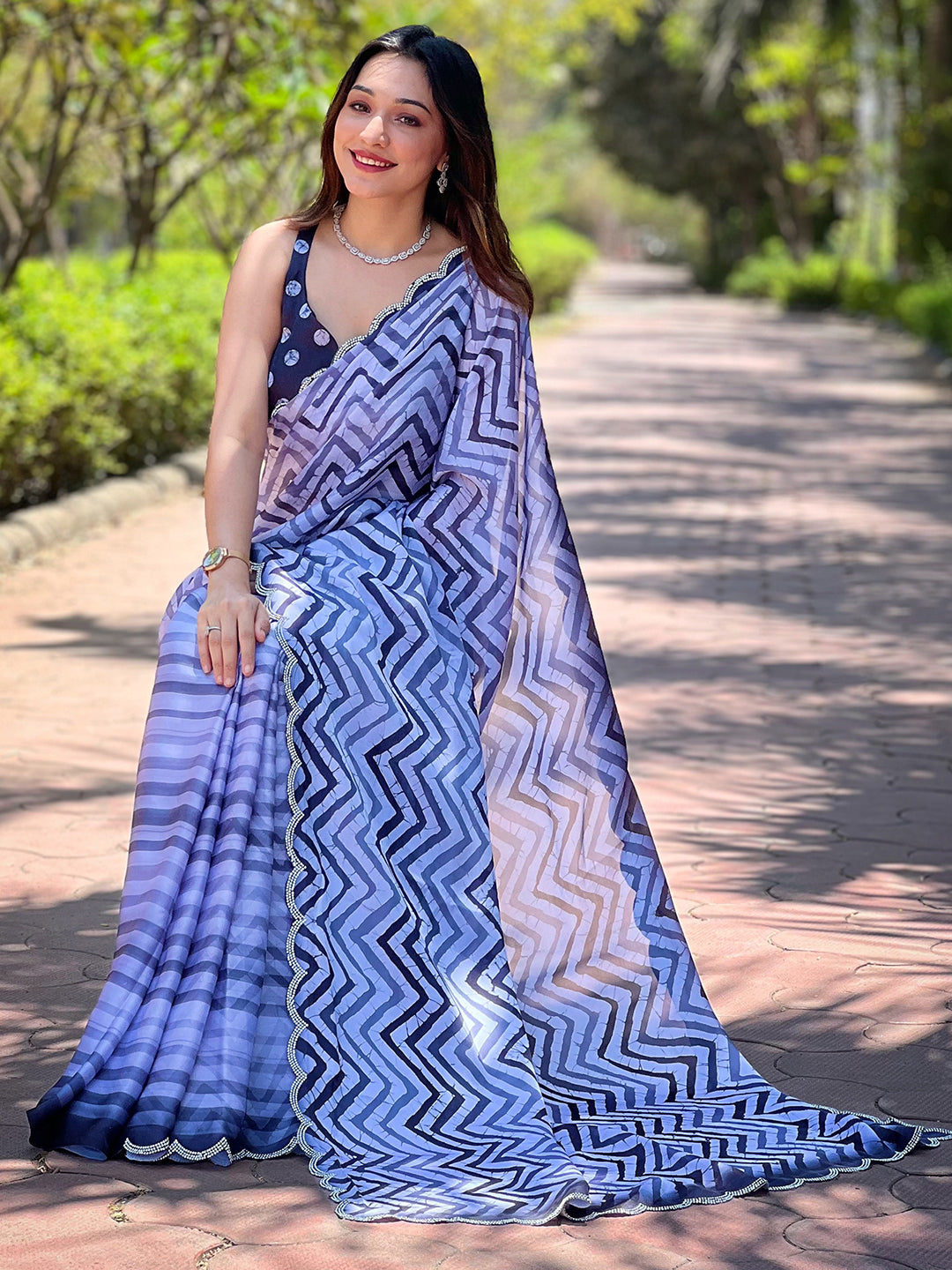 Beautiful Leheriya And Striped Print Saree