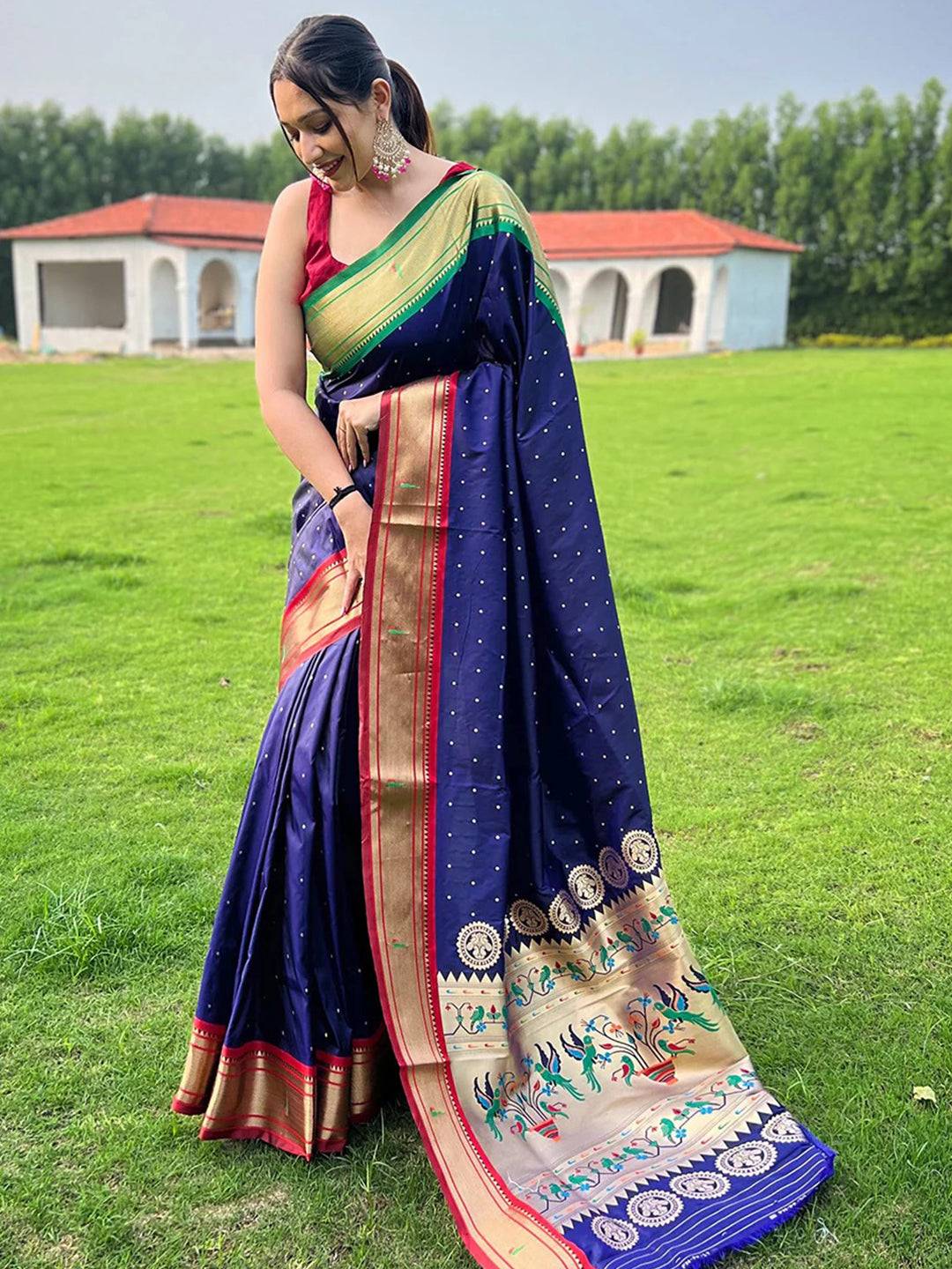 Navy blue Paithani saree with intricate Ganga Jamuna border design