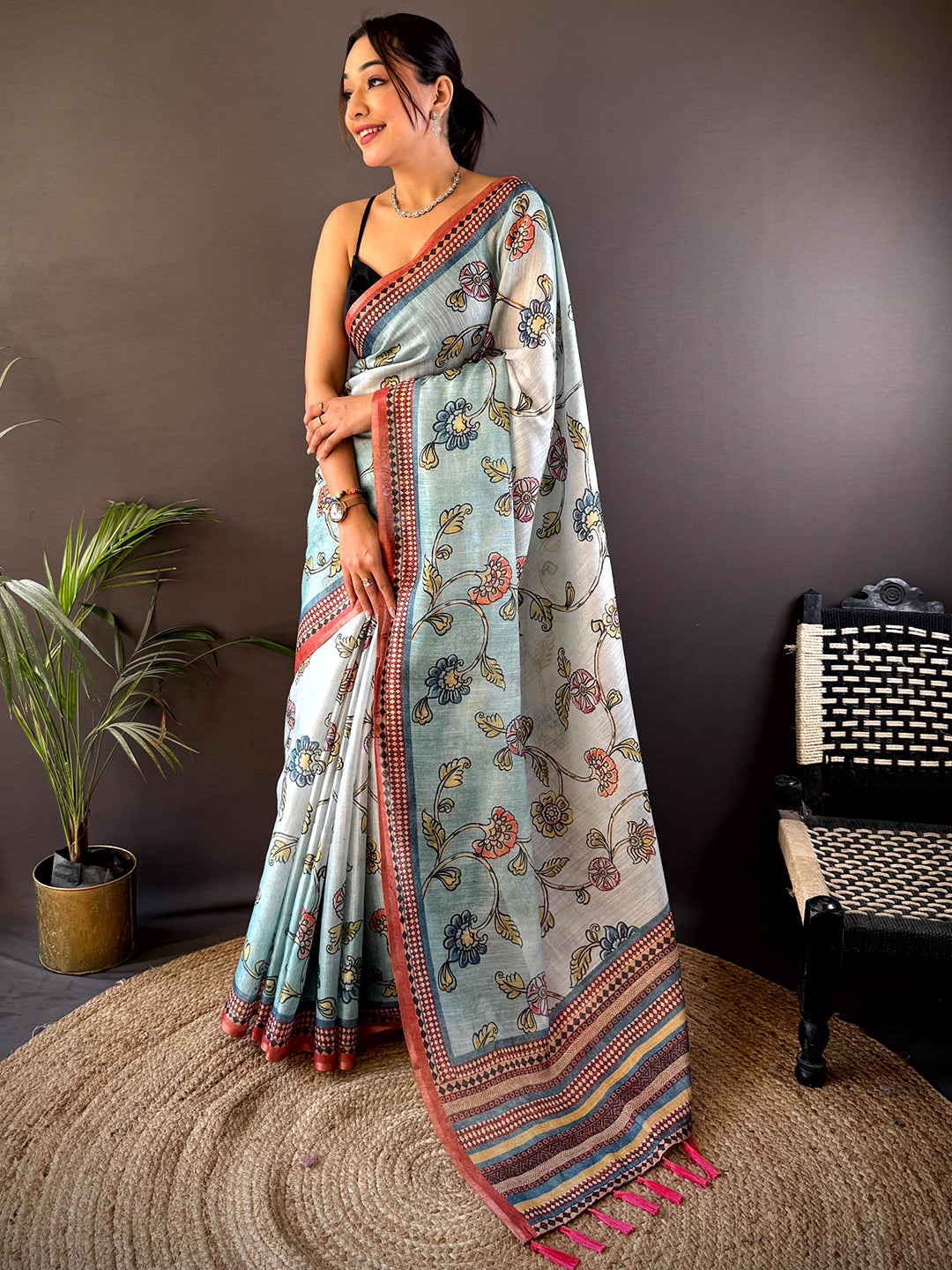 Shop Sky Blue Zari Tussar Floral Saree featuring delicate floral motifs and a rich border, ideal for parties and traditional celebrations.