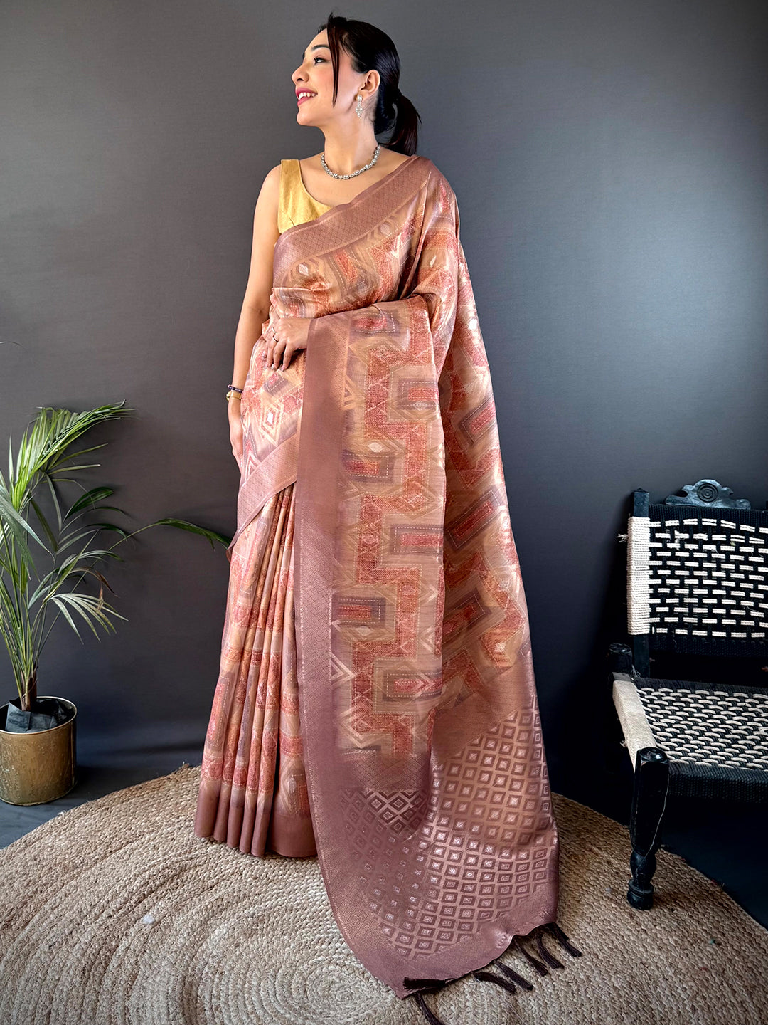 Shop Brown Banarasi Silk Katan Geometric Saree featuring exquisite craftsmanship and traditional design. Ideal for parties and celebrations.