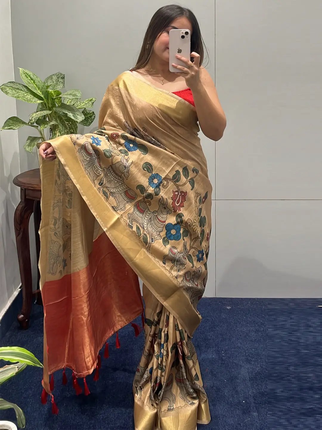 Model showcasing Pen Kalamkari Linen Tissue Soft Saree details