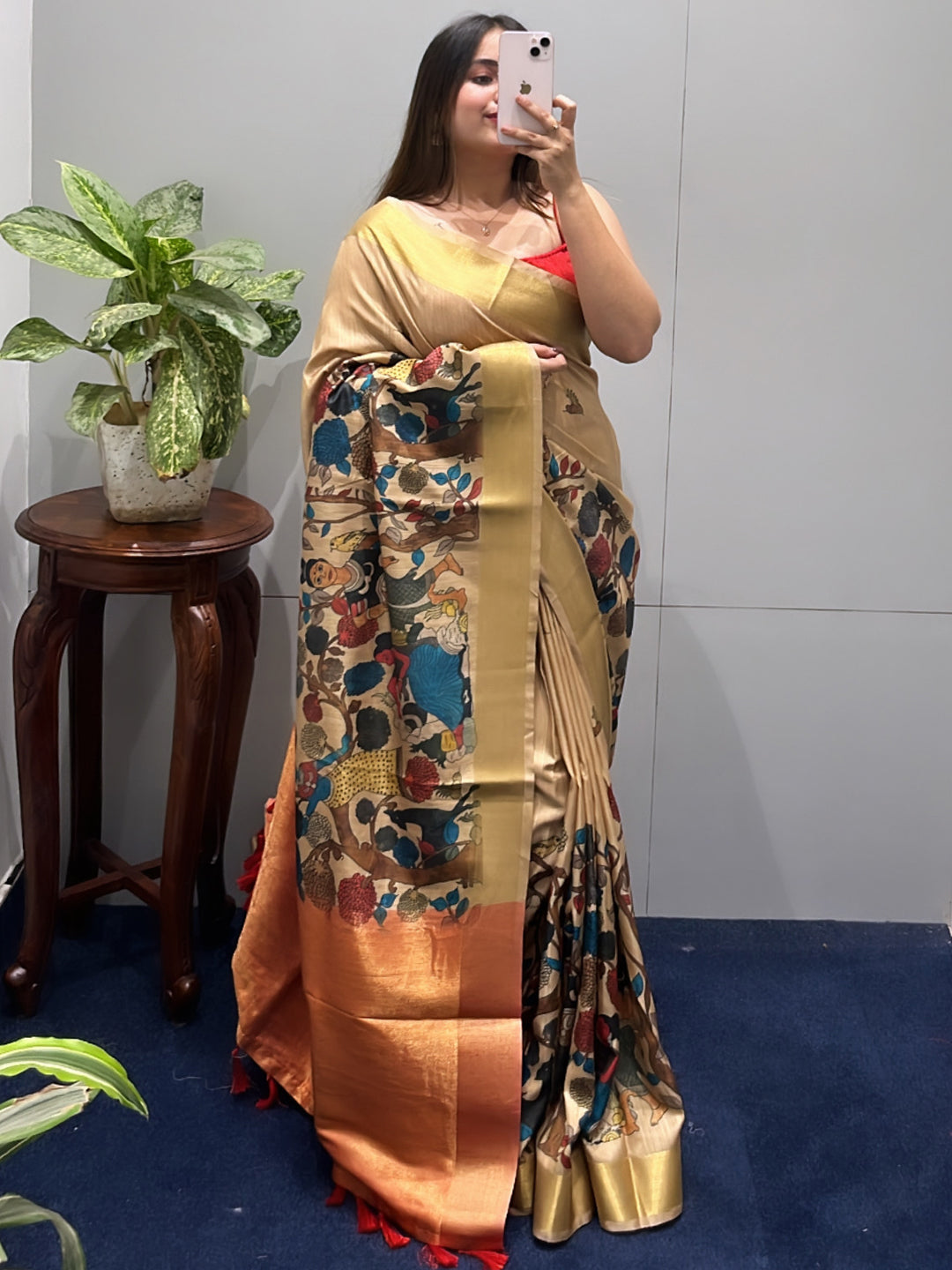 Beautiful Kalamkari saree in linen tissue with vibrant floral motifs