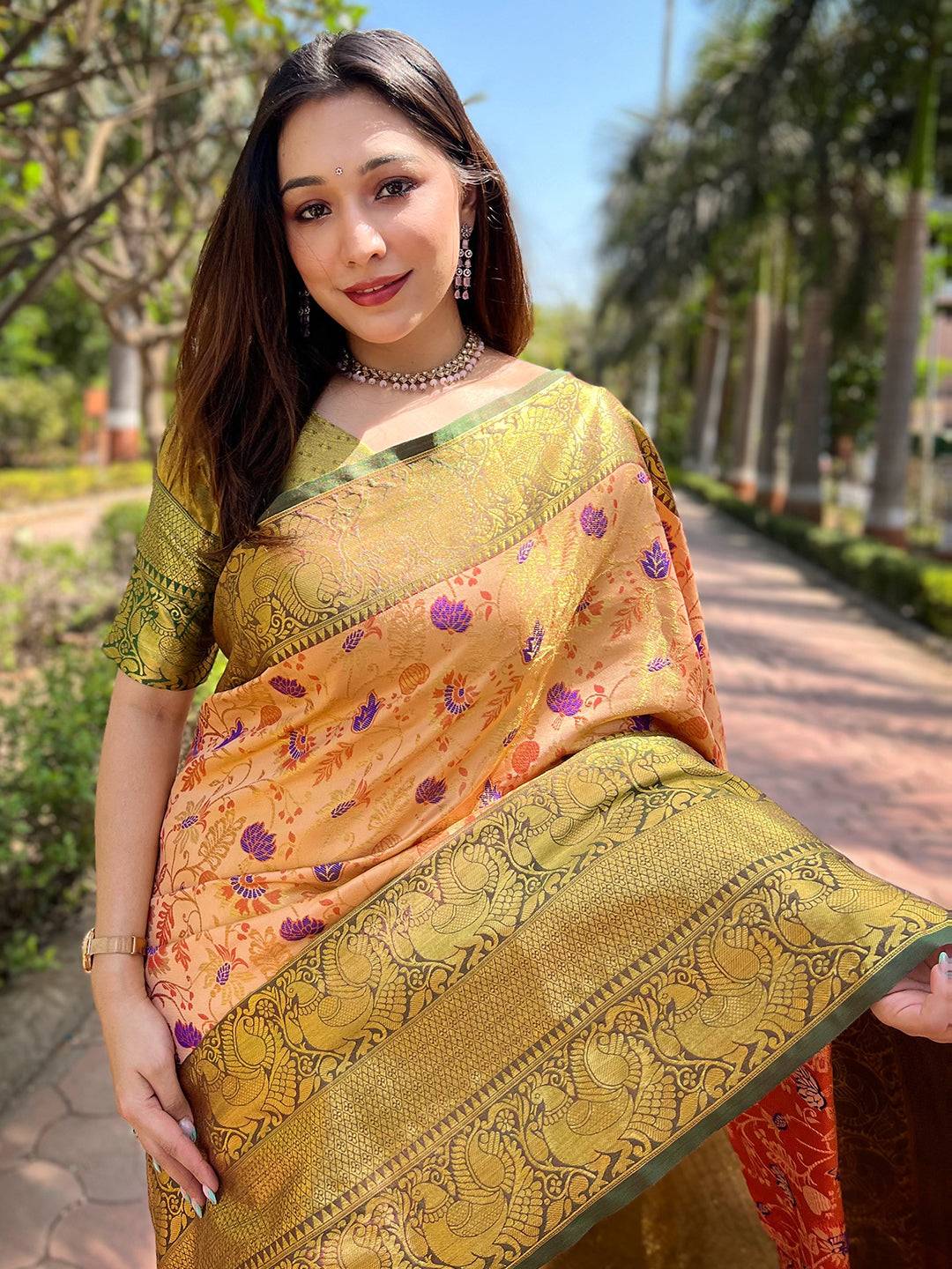 Orange Banarasi tissue silk saree with intricate Zari Butti design