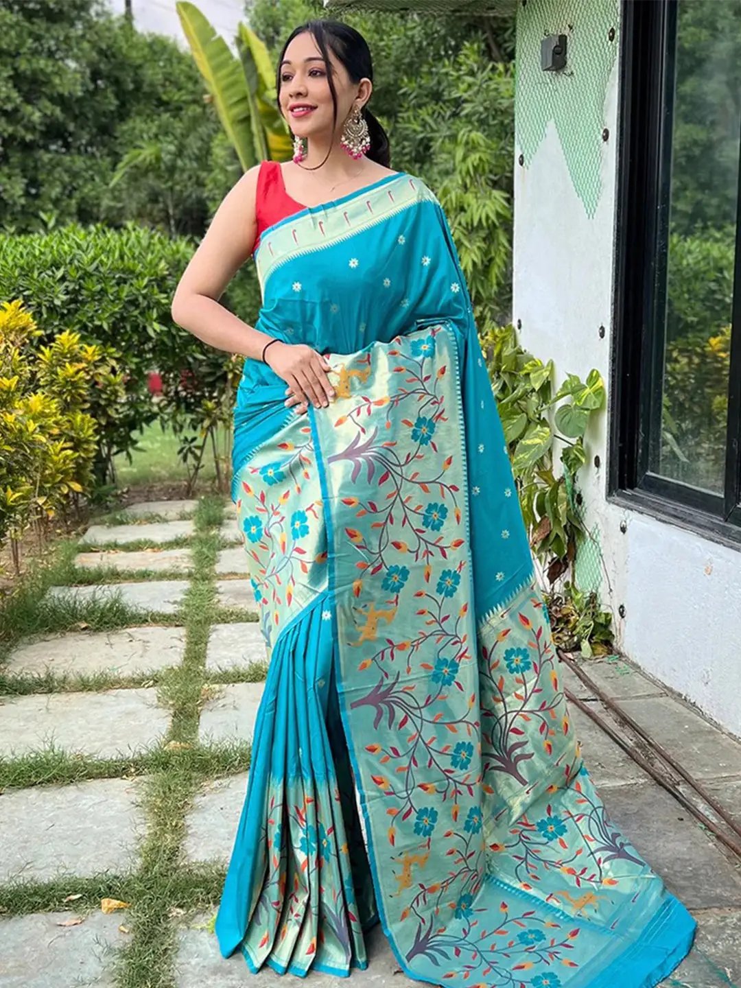 Turquoise Paithani saree with big border and floral design