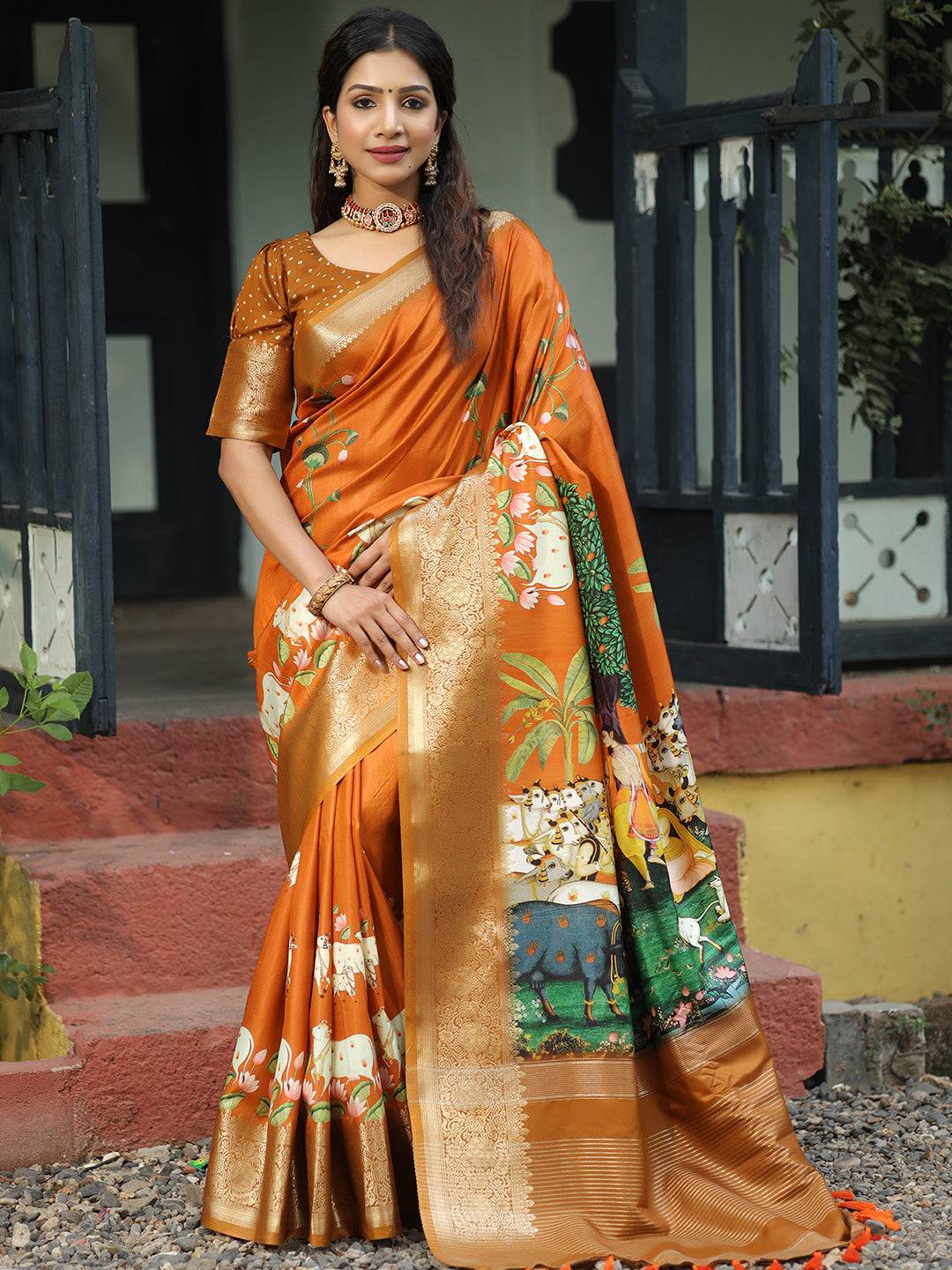 Viscose Dola Silk Orange Saree with Floral and Mughal Print