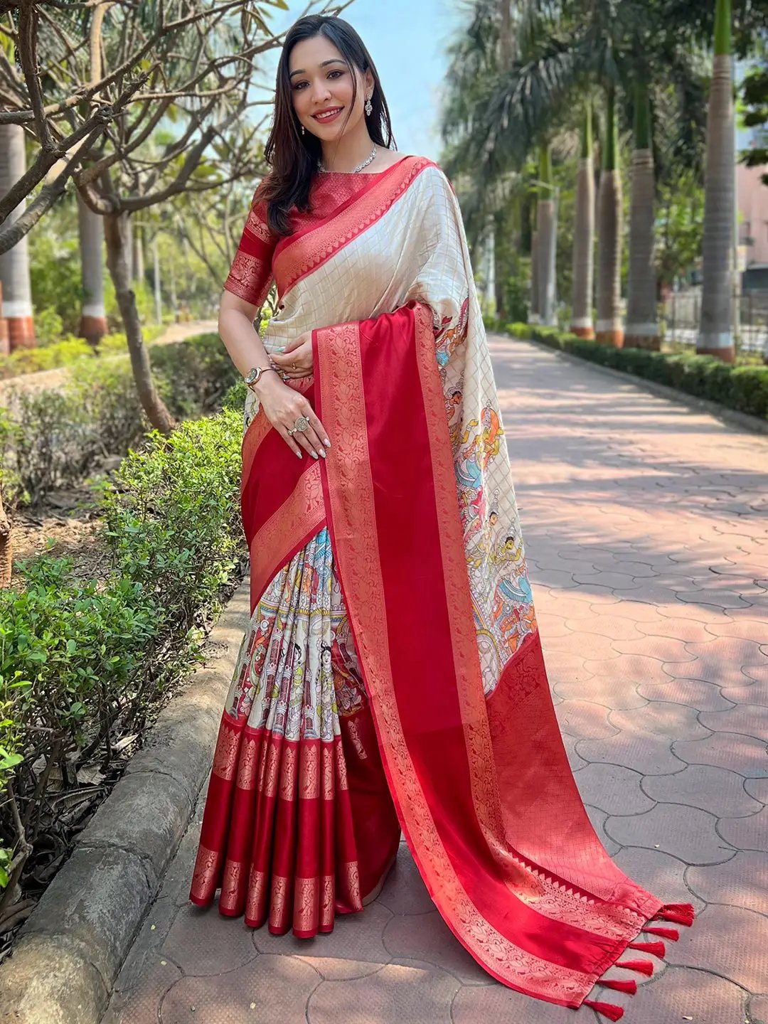 Cream and red Banarasi silk saree with double border design