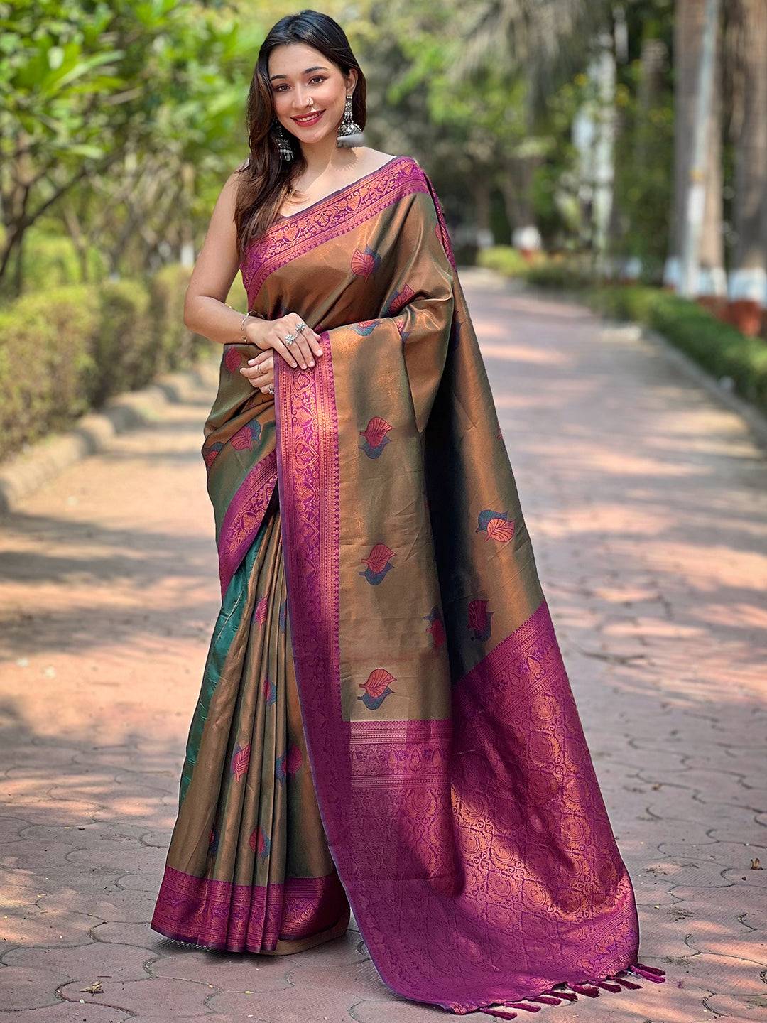 Model showcasing Midium Bronze Kanjivaram Saree with intricate gold weaving.