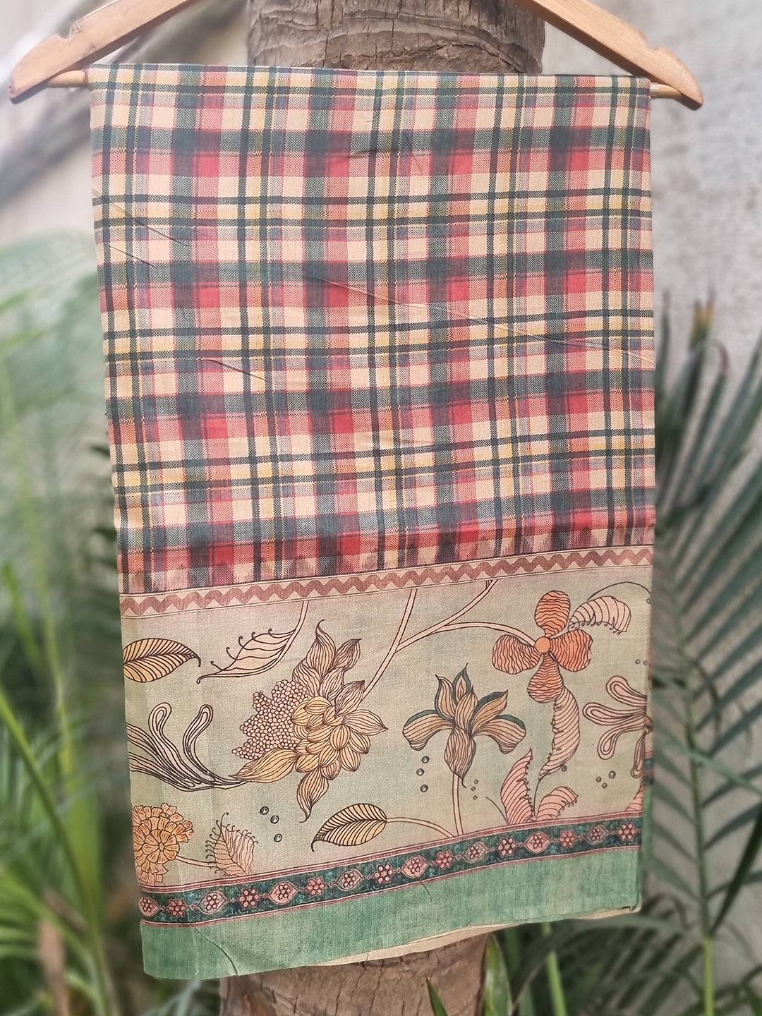 Light green tussar silk saree with floral kalamkari and chex motifs