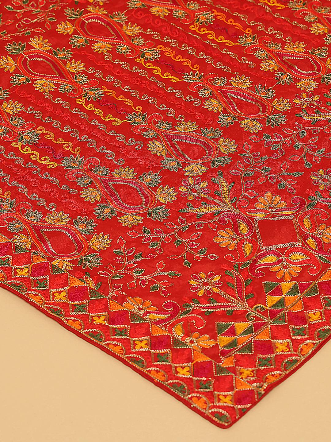 Close-up of red dupatta showcasing resham thread embroidery