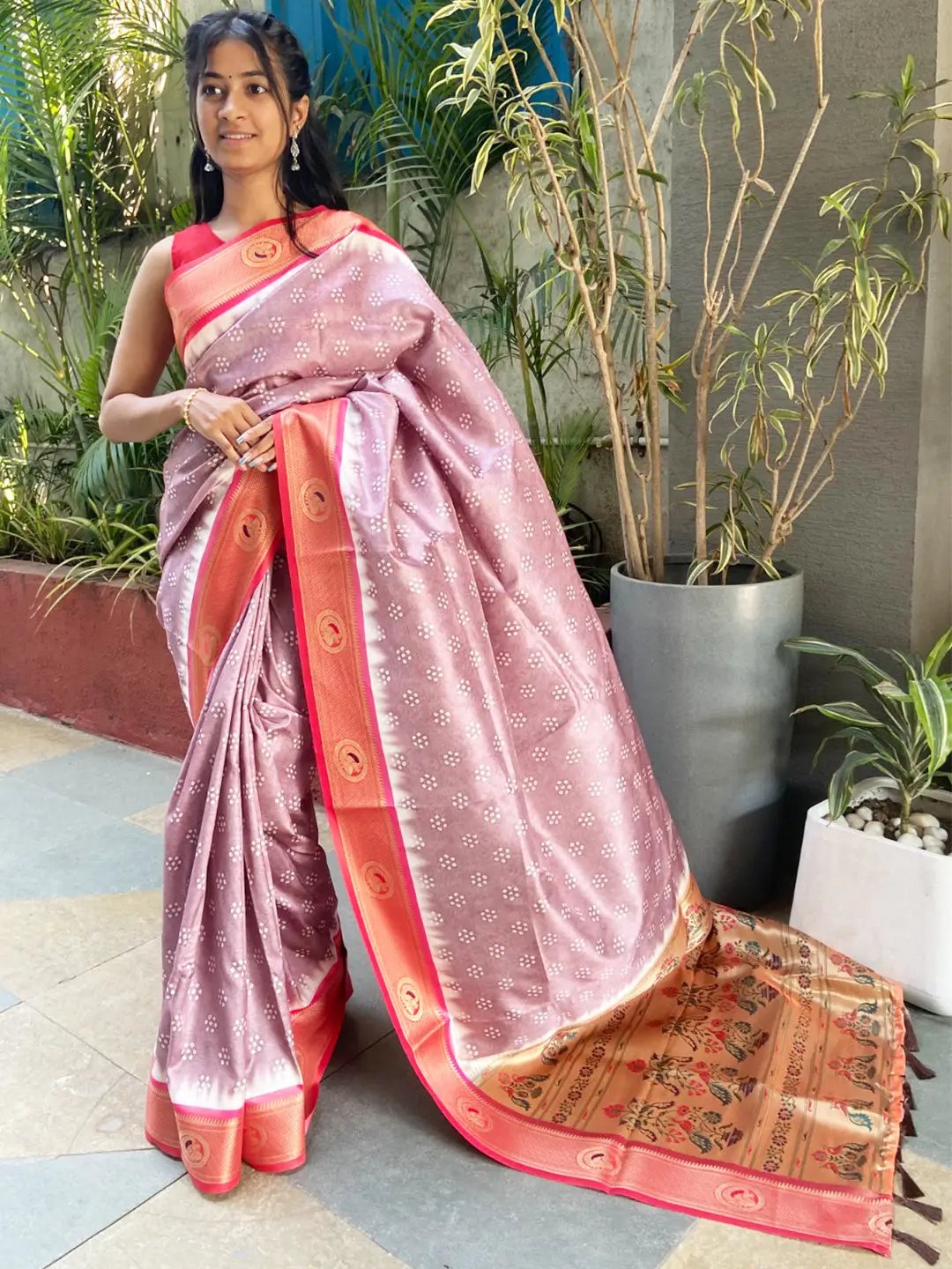 Model wearing Paithani Minakari Pallu Bandhej Print Saree