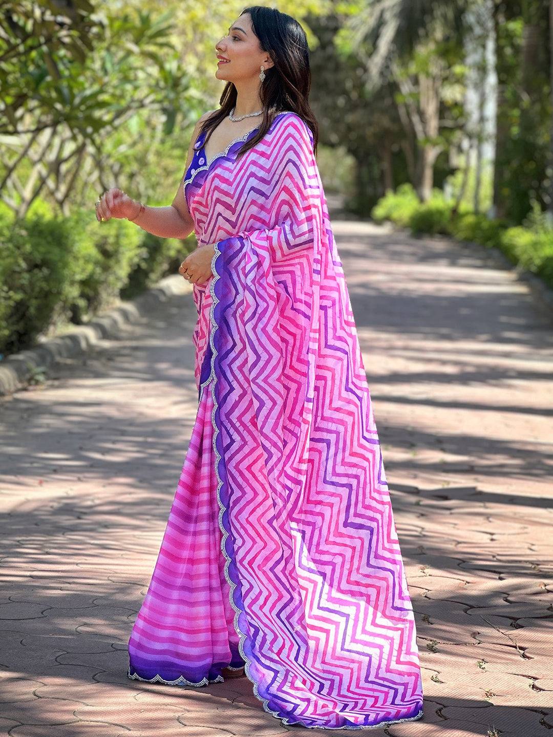 Side view of pink and purple leheriya saree