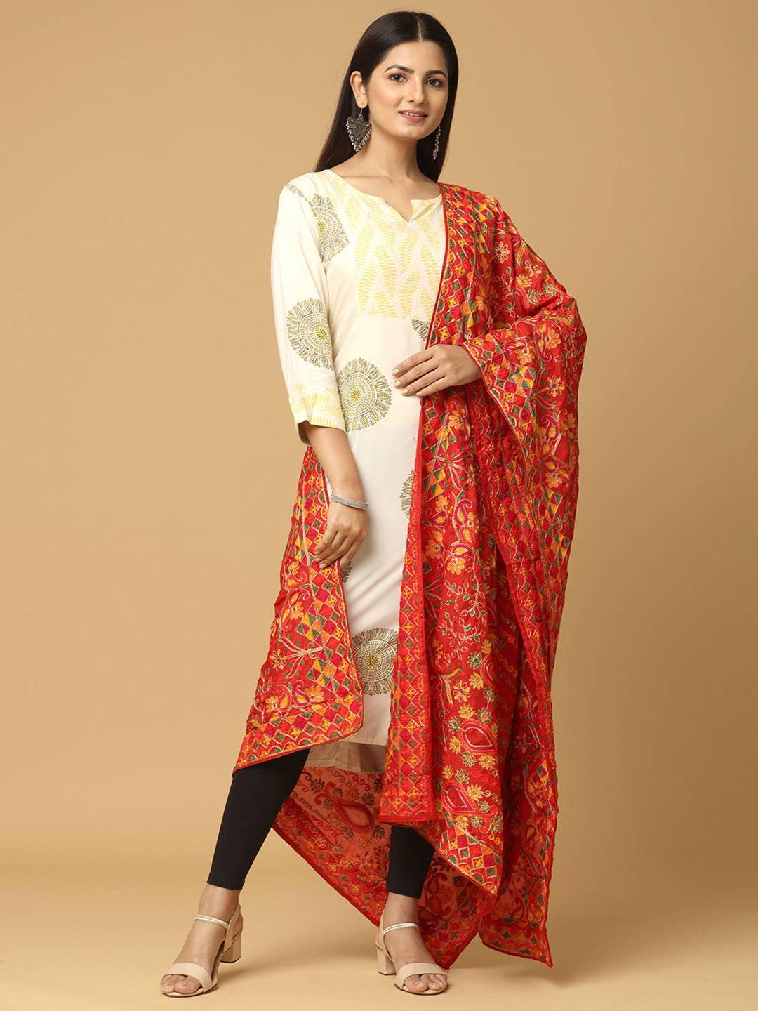 Model wearing red chiffon dupatta with ethnic motifs