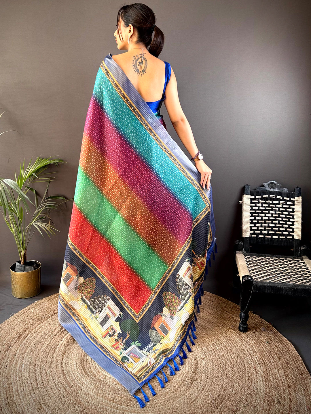 Back view of Heritage Silk Blend Bandhani Print Saree with colorful patterns and tassel detailing, ideal for traditional and ceremonial wear.