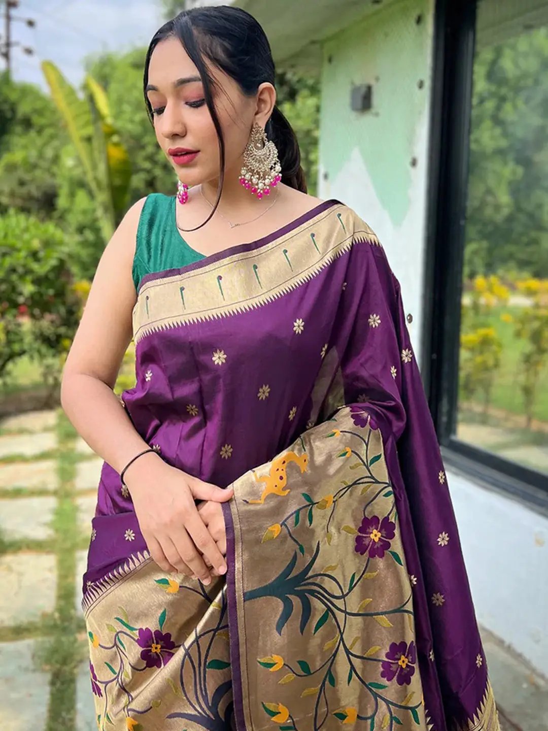 Elegant purple Paithani saree with intricate woven border