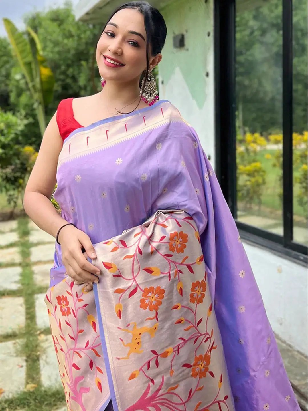 Elegant lavender Paithani saree with floral design