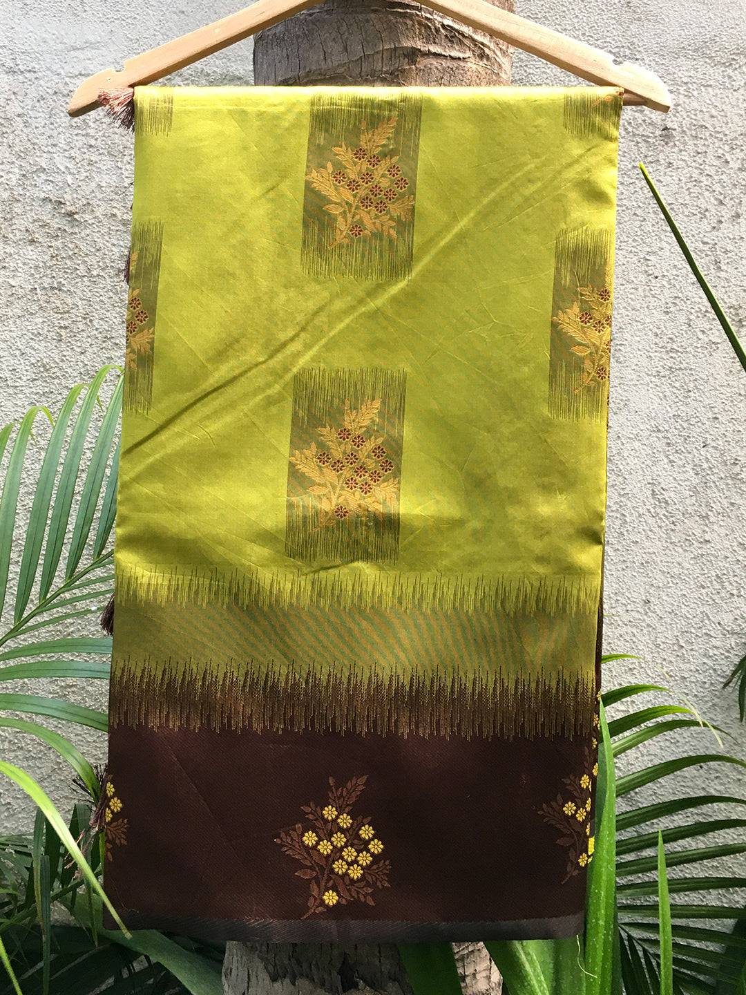 Green Sami Banarasi Tussar Silk Saree hanging display