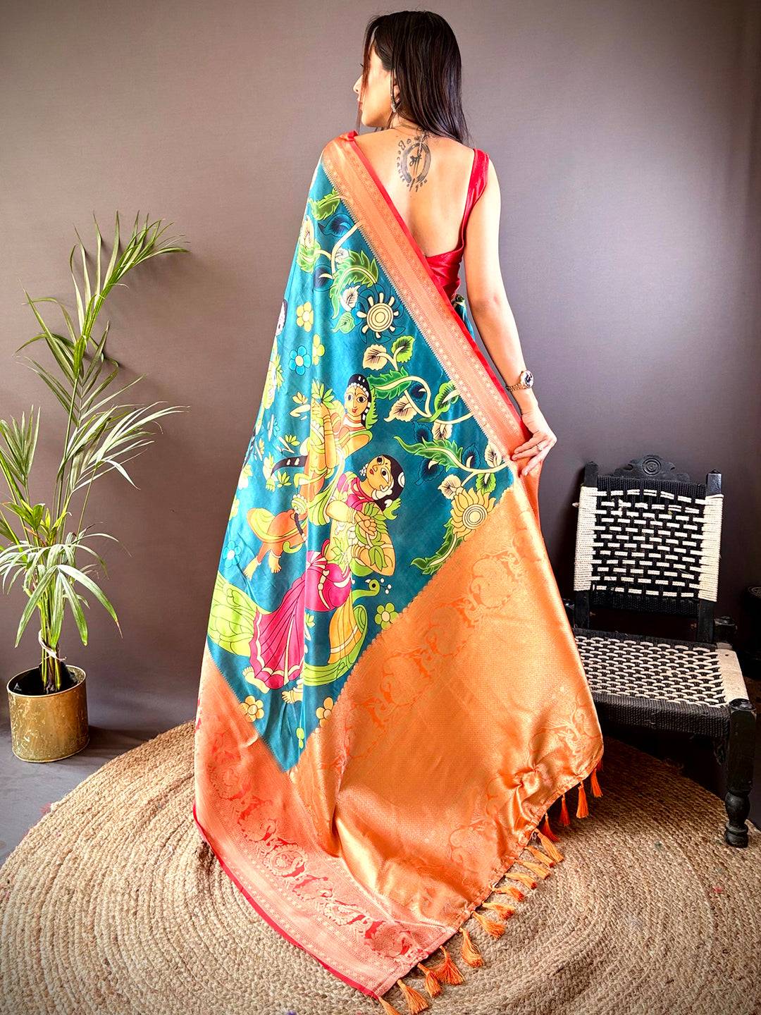 Back view of Rama soft silk saree showcasing Pichwai Kalamkari design.