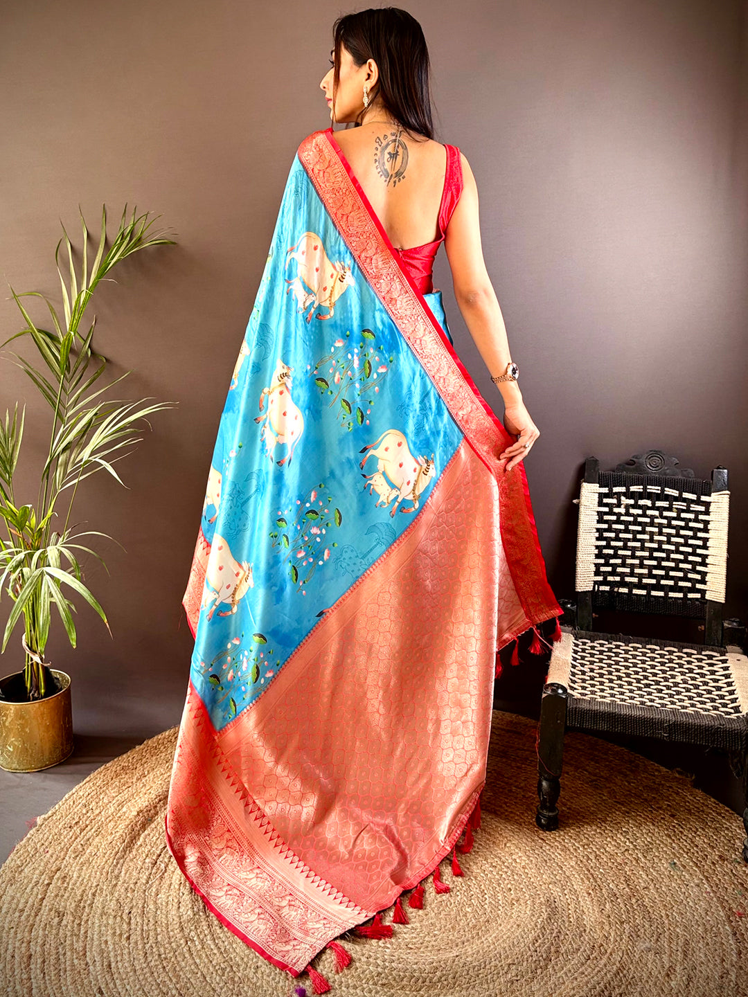 Back view of blue silk saree with intricate Pichwai Kalamkari design