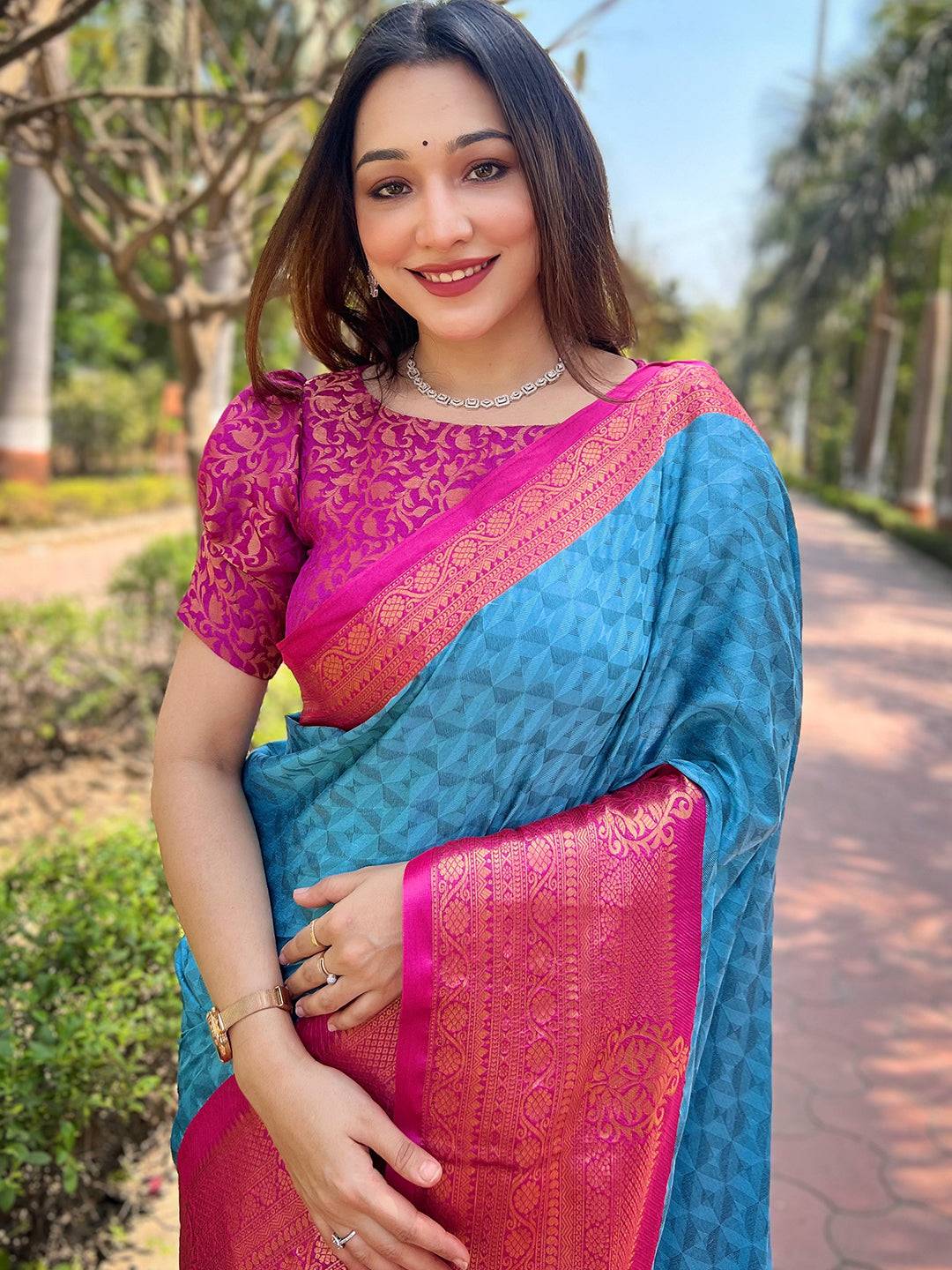 Model wearing stylish Kanjivaram silk saree with zari blouse