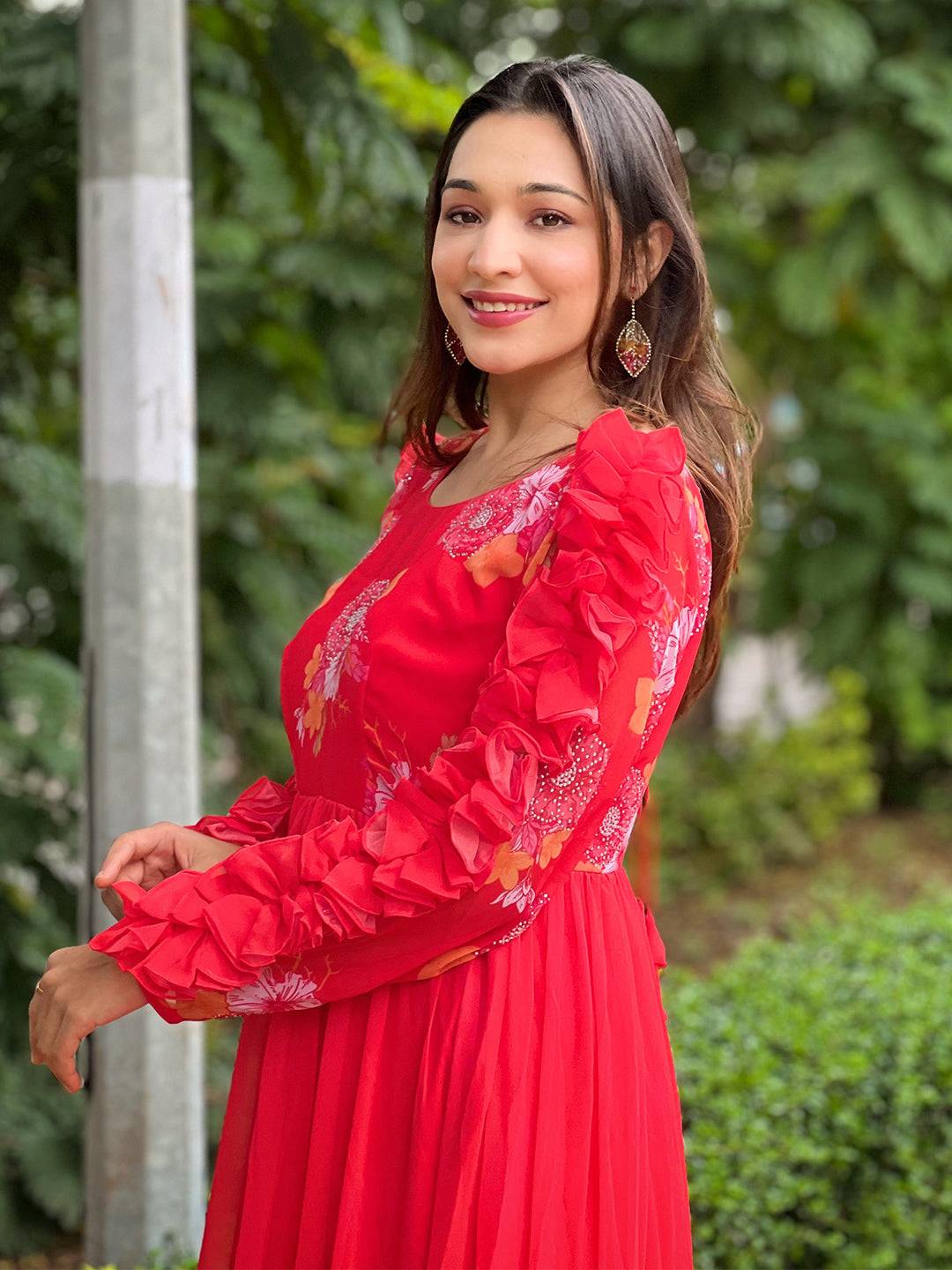 Close-up of Radiant Ruby Dress with floral embroidery