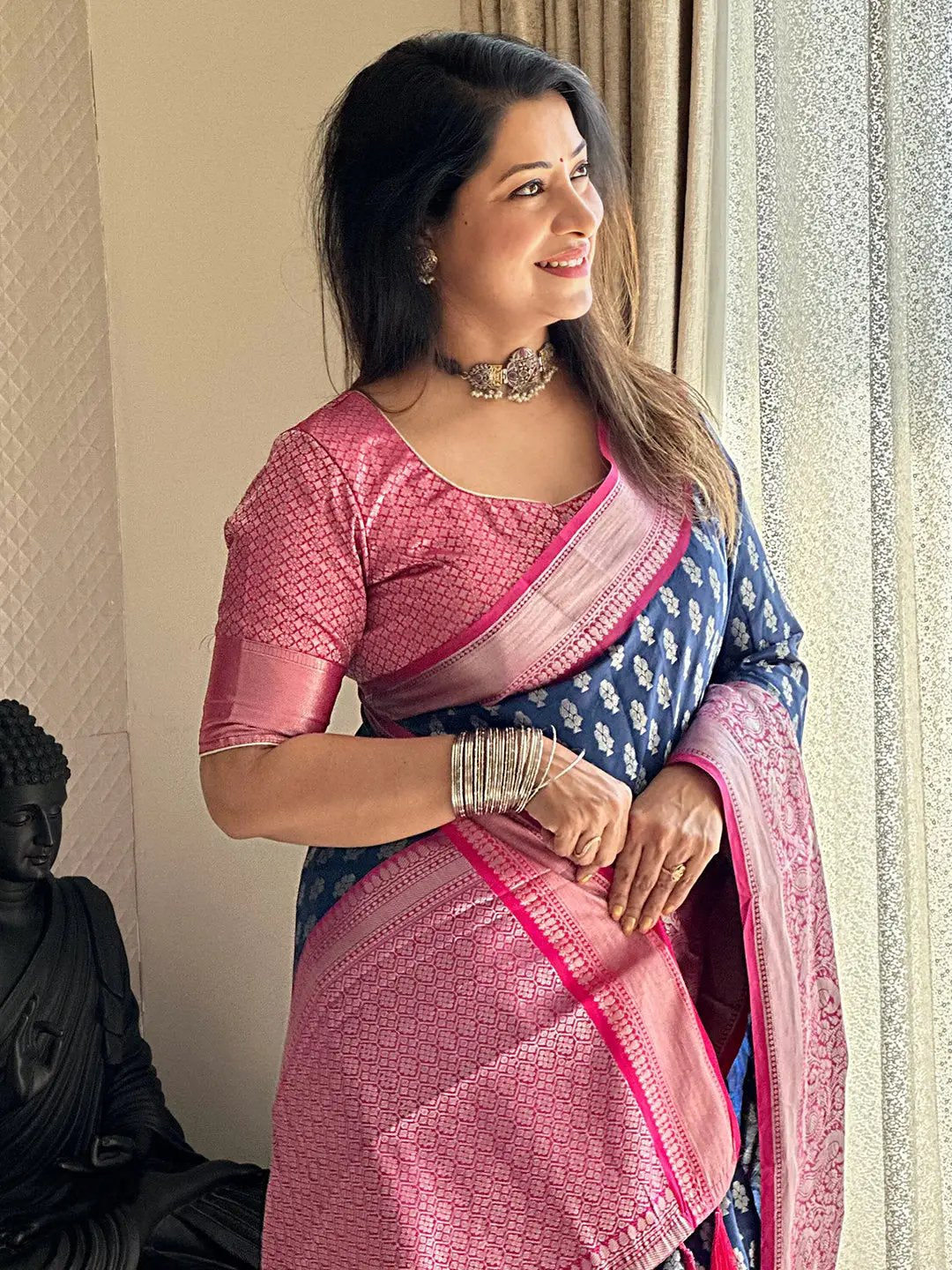 Close-up of Blue Banarasi Katan Silk Saree with pink blouse