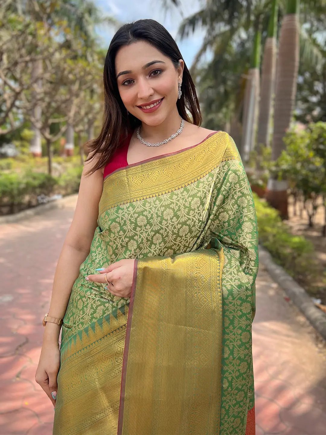 Model in Pista Tissue Saree with Gold Jacquard Woven Work